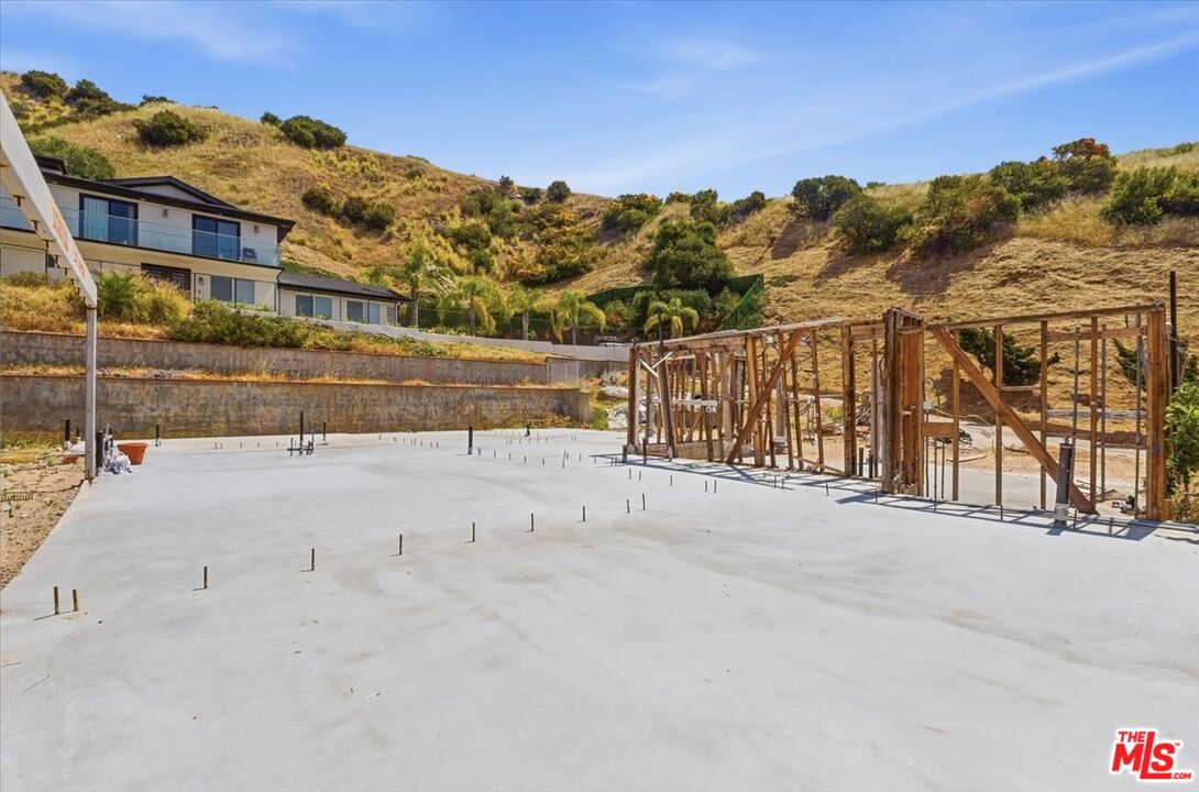 9865 Lanark Street Sun Valley, CA 91352 - Photo 6 of 13 a view of large building with a road