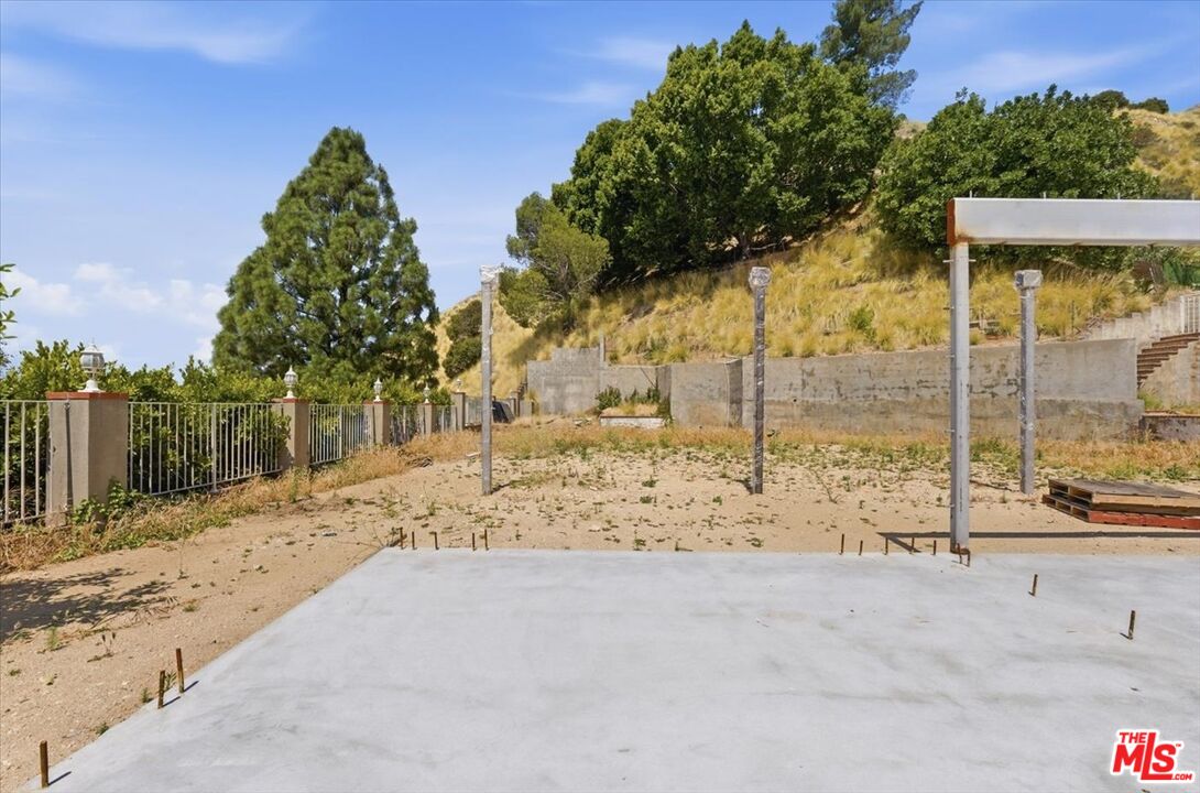 9865 Lanark Street Sun Valley, CA 91352 - Photo 7 of 13 a view of a backyard of the house