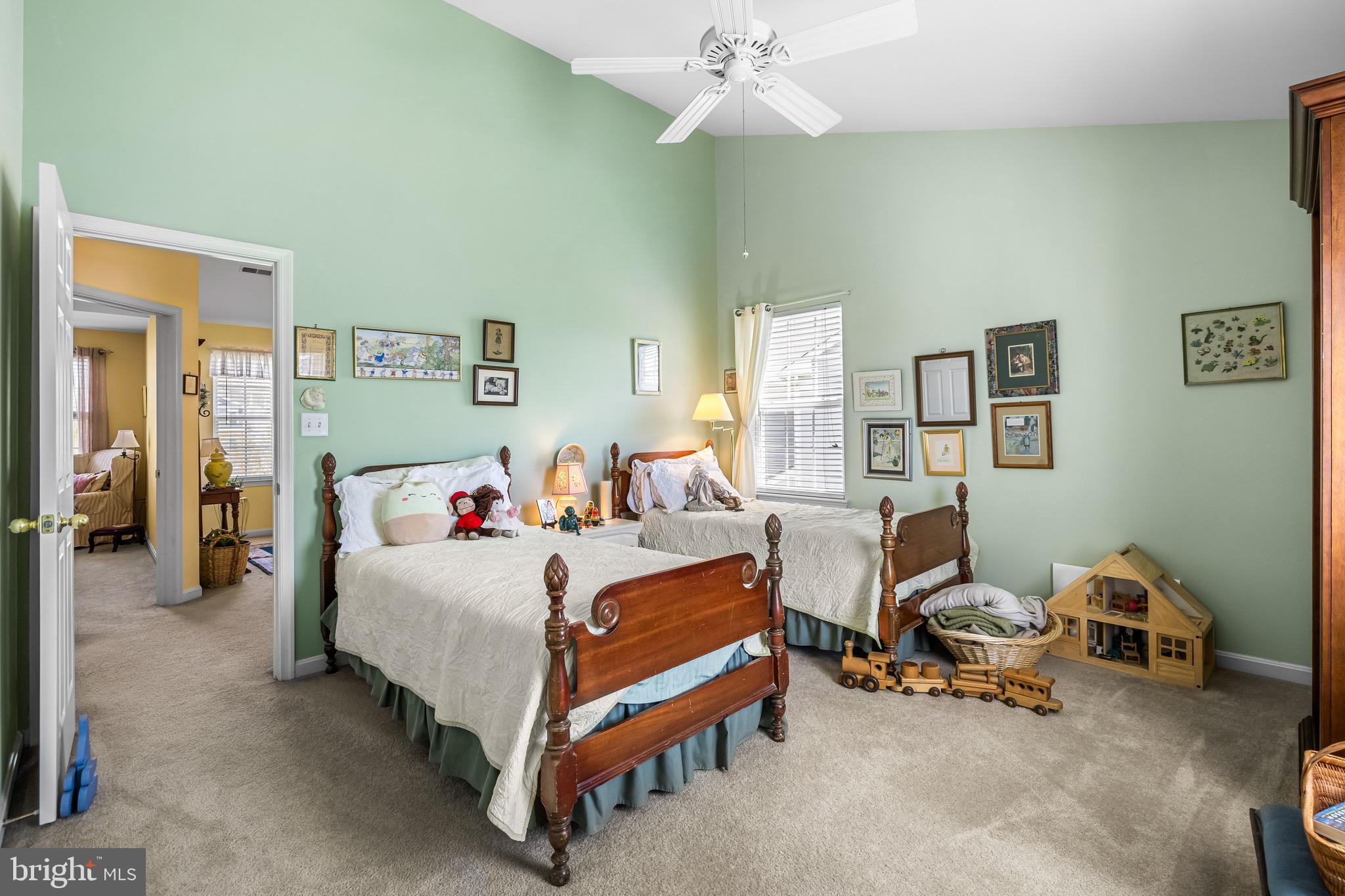 1713 Mystic Circle Baltimore, MD 21221 - Photo 22 of 37 a bedroom with a bed and a chandelier