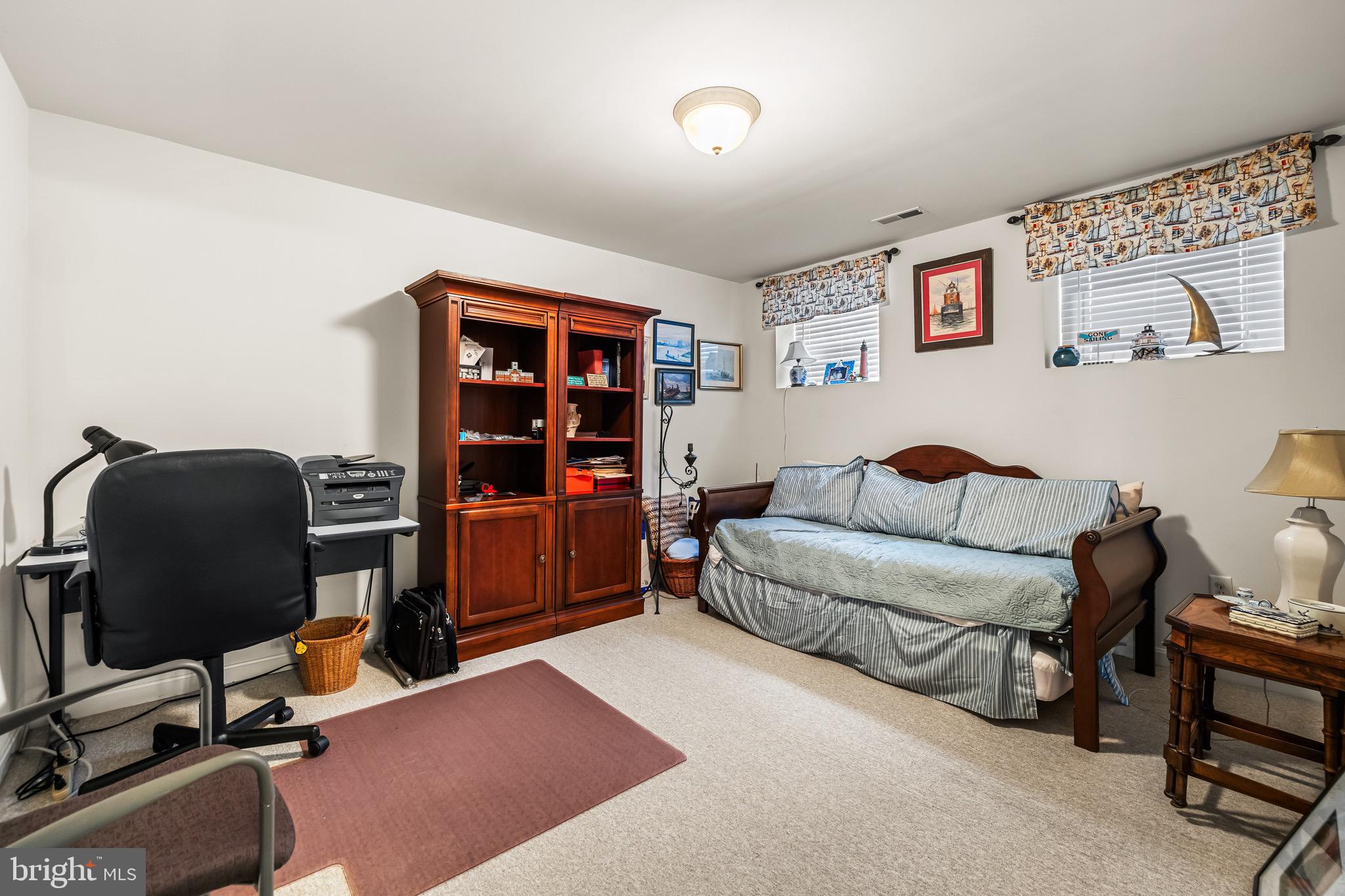 1713 Mystic Circle Baltimore, MD 21221 - Photo 30 of 37 a livingroom with workspace and a couch