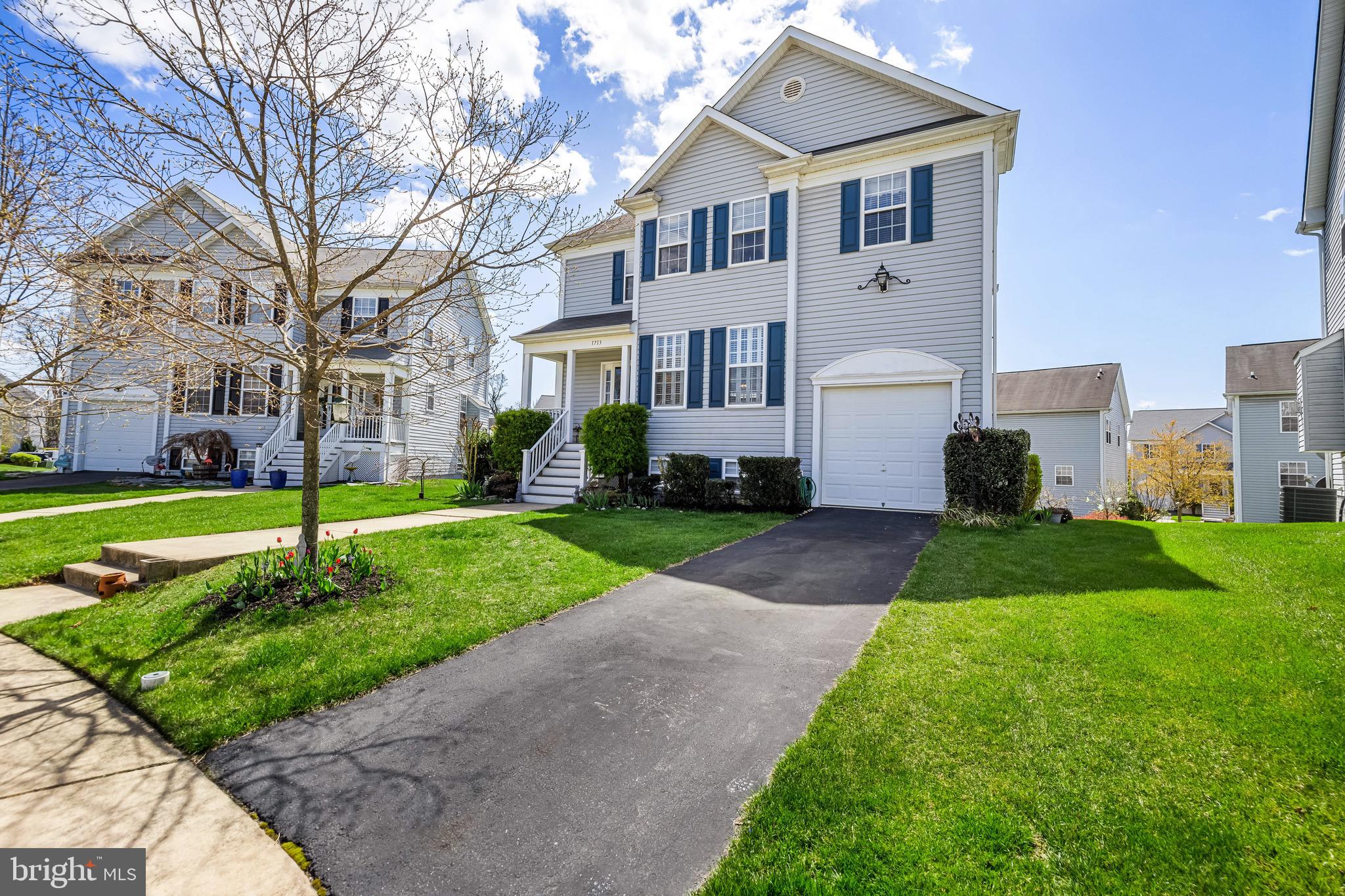1713 Mystic Circle Baltimore, MD 21221 - Photo 37 of 37 a front view of a house with a yard