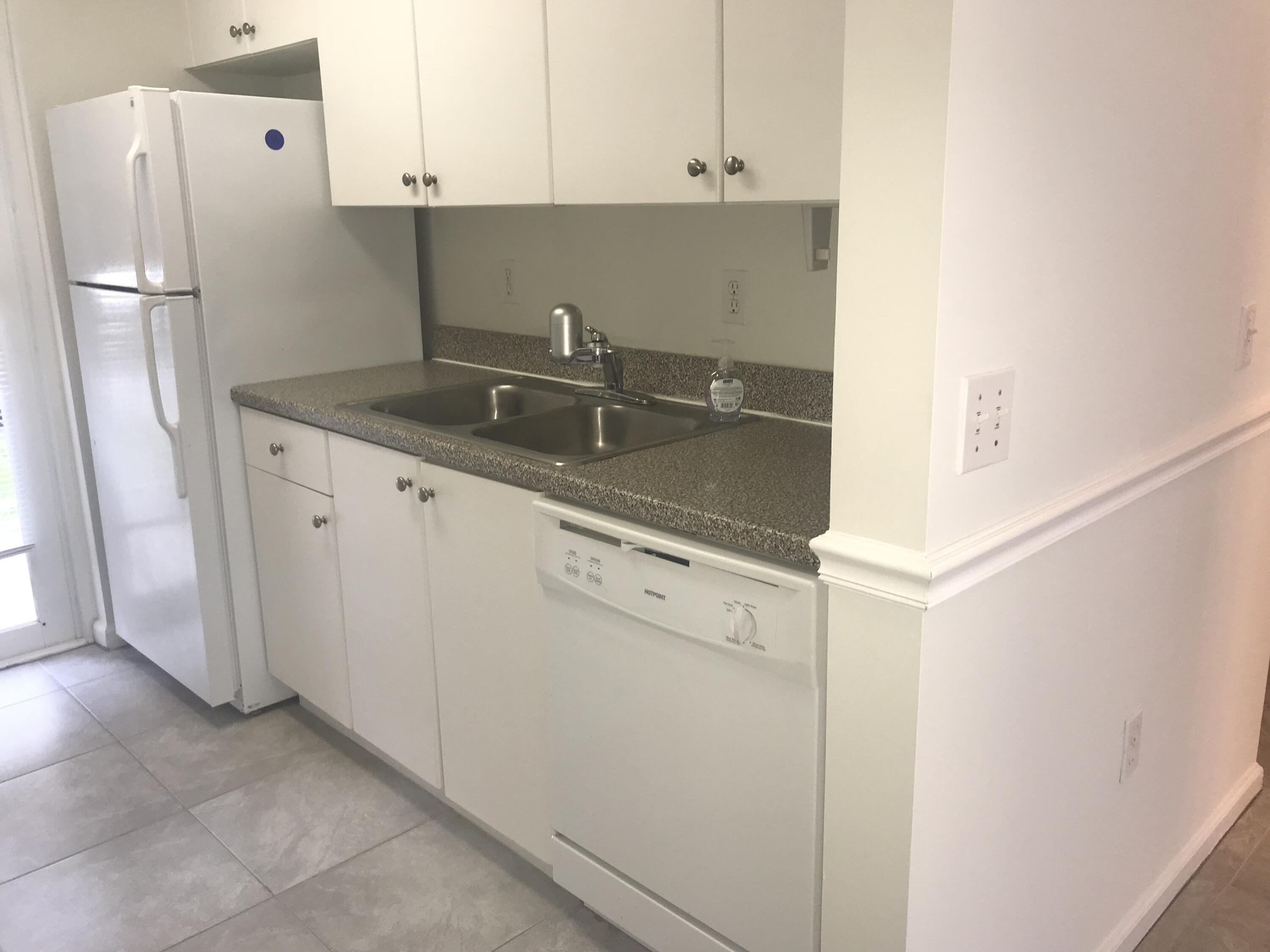 4812 Central Boulevard, Unit 15 Jupiter, FL 33458 - Photo 5 of 11 IMG_3829