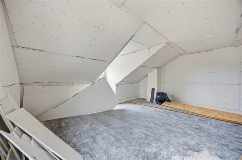 a view of a room with an empty space