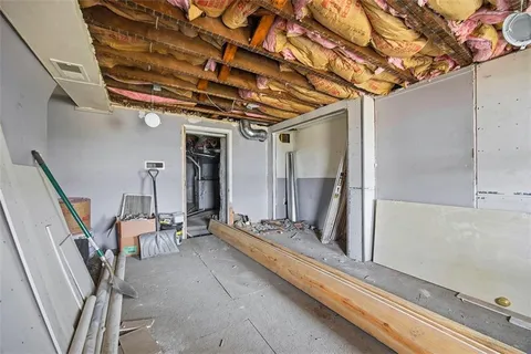 a view of room with furniture