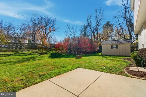 a view of backyard with green space