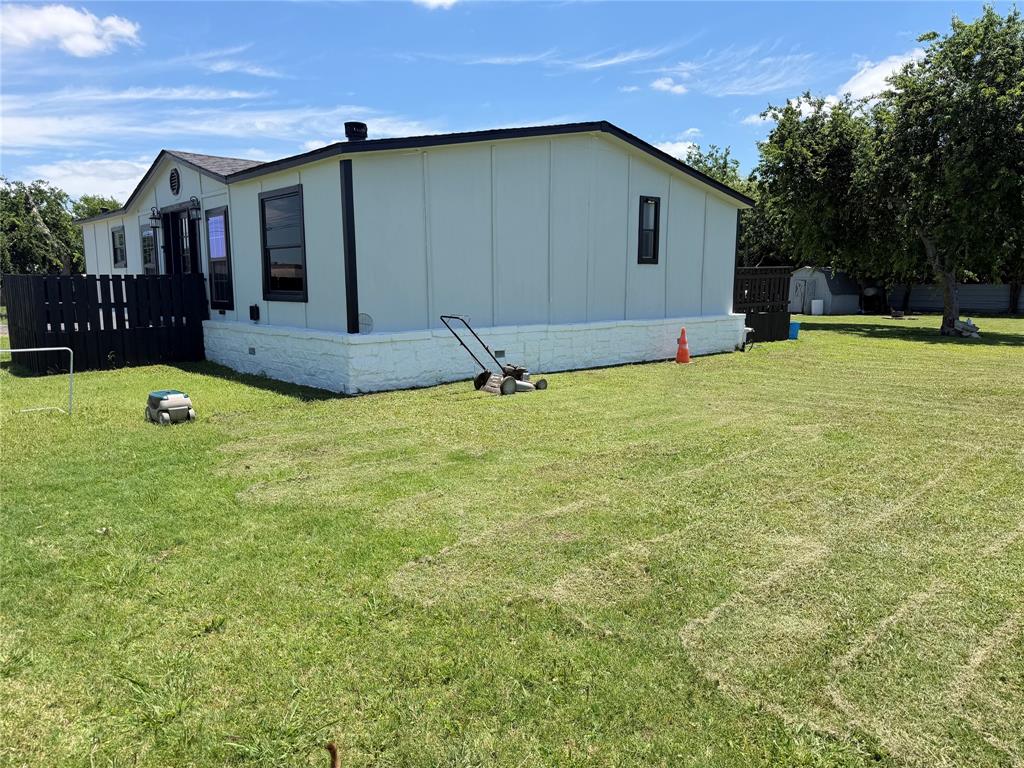 222 Hix Road Cleburne, TX 76031 - Photo 18 of 27 a house view with a garden space