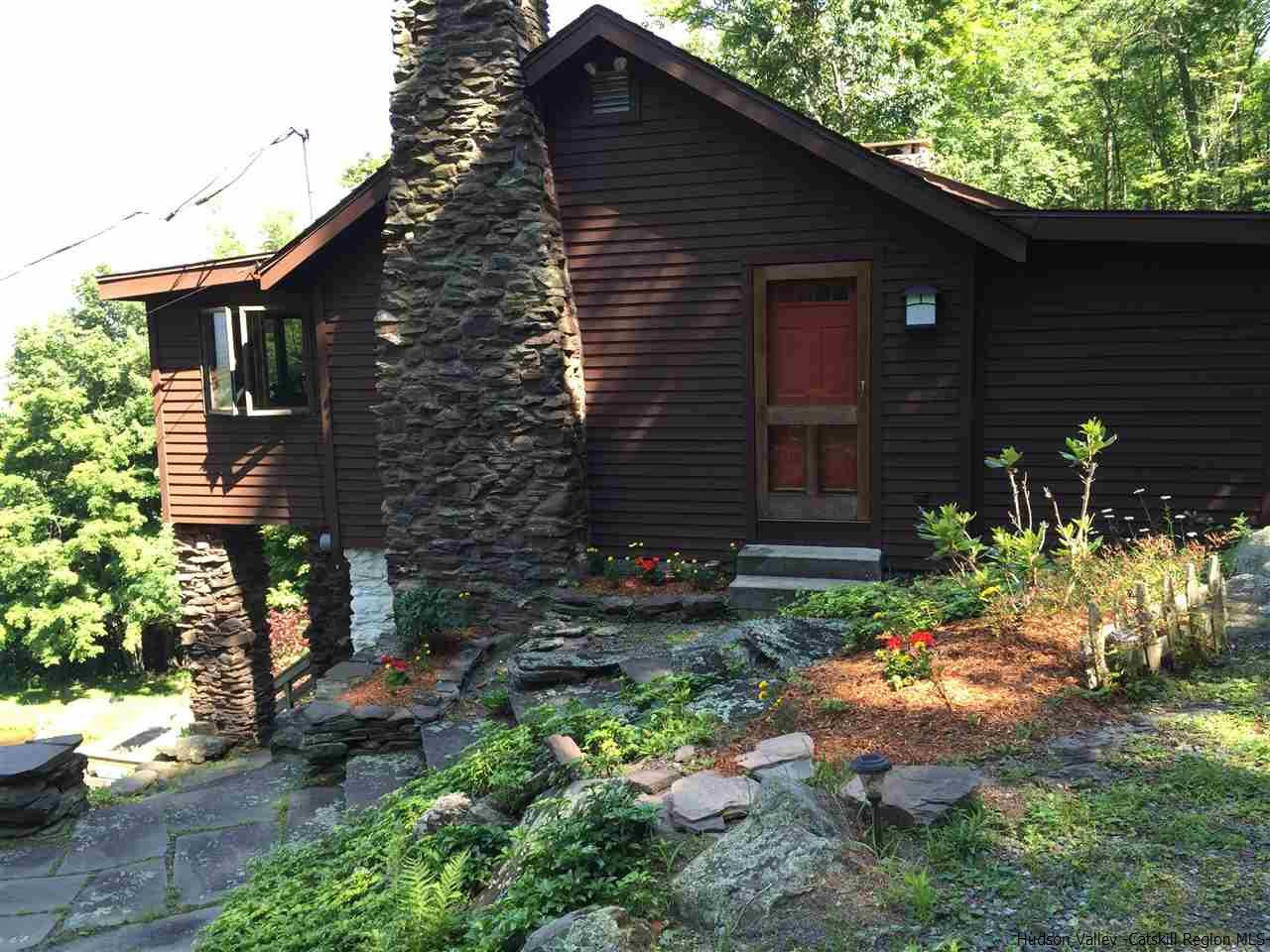 2727 Vega Mountain Road Roxbury, NY 12421 - Photo 4 of 31 a front view of a house with garden