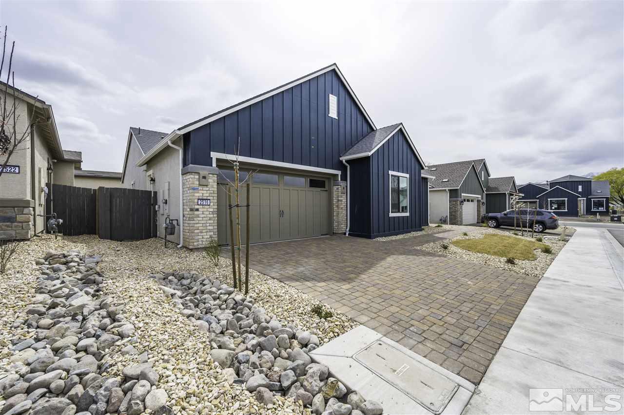 2516 Titanium Crest Drive, Unit HOMESITE 36 Reno, NV 89521 - Photo 2 of 19 a view of a house next to a yard