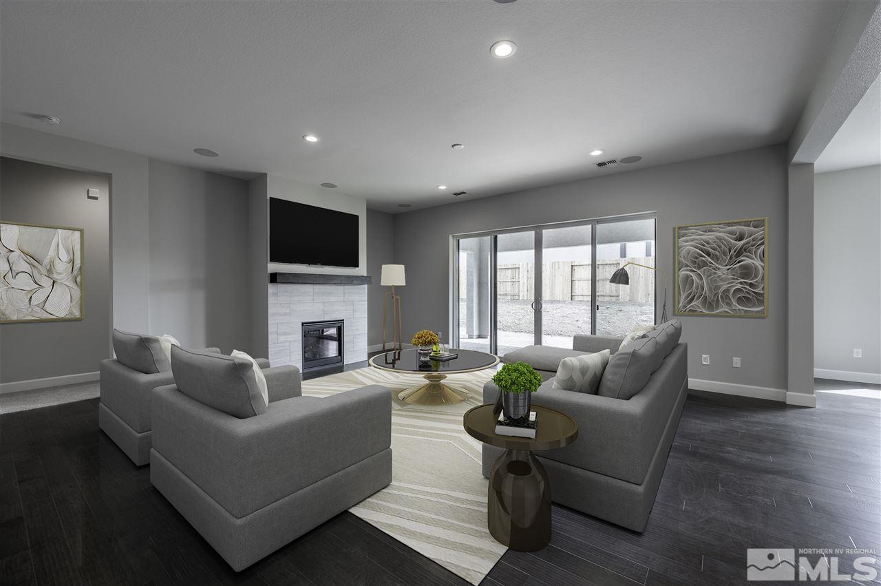 2516 Titanium Crest Drive, Unit HOMESITE 36 Reno, NV 89521 - Photo 4 of 19 a living room with fireplace furniture and a flat screen tv