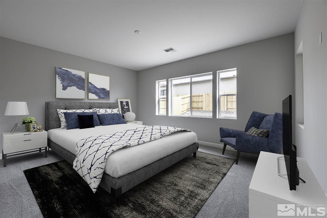 2516 Titanium Crest Drive, Unit HOMESITE 36 Reno, NV 89521 - Photo 9 of 19 a bedroom with a bed and glass window