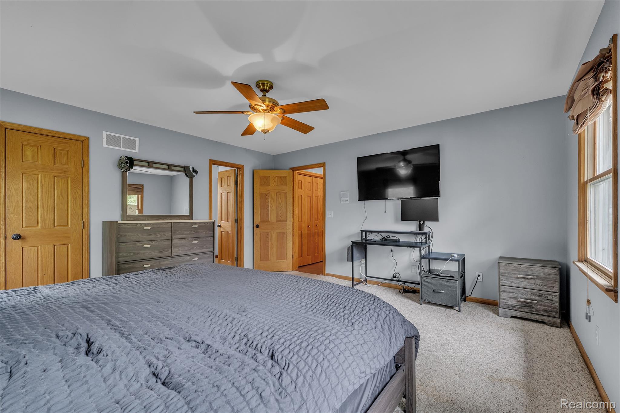 1345 Ives Road Mason, MI 48854 - Photo 34 of 92 Carpeted bedroom featuring a ceiling fan and baseboards