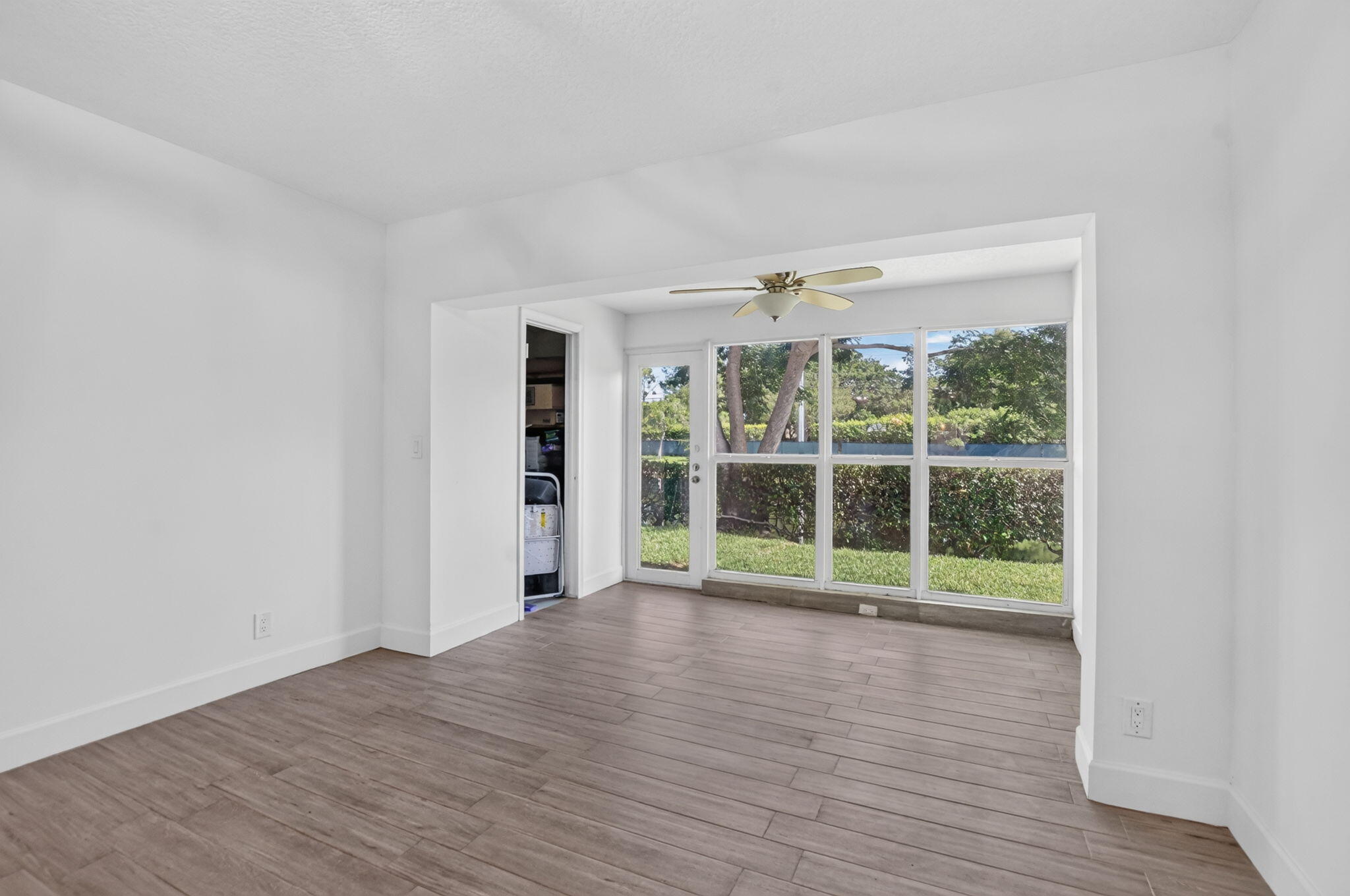 8681 Boca Drive, Unit 20 Boca Raton, FL 33433 - Photo 14 of 54 Enclosed Florida Room
