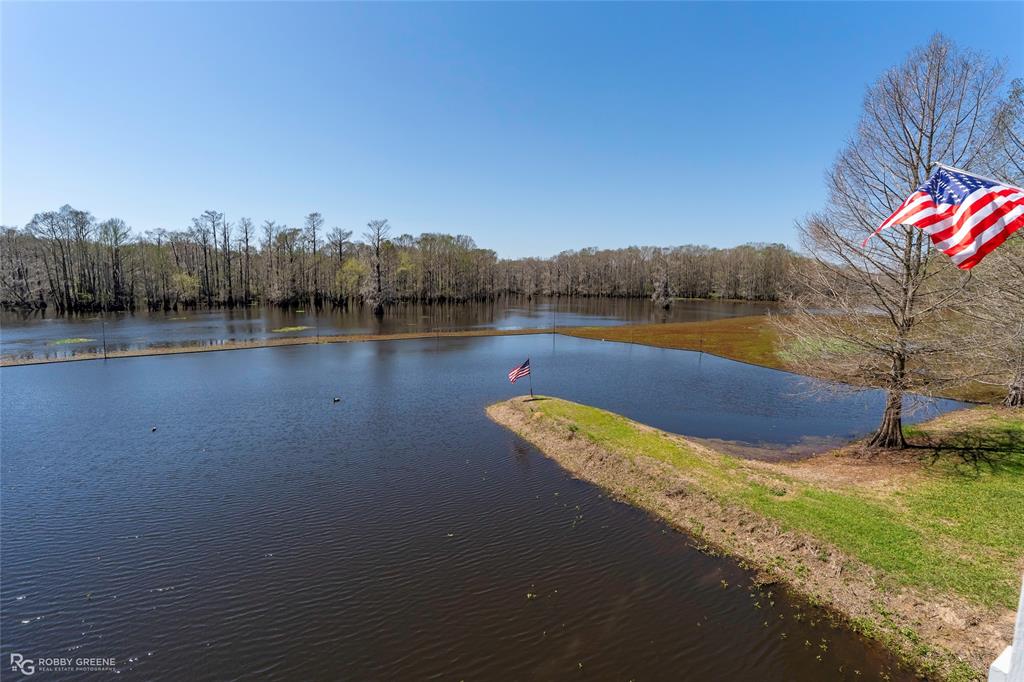 350 Brushy Creek Road Sibley, LA 71073 - Photo 11 of 40 a view of a lake with mountain in the background