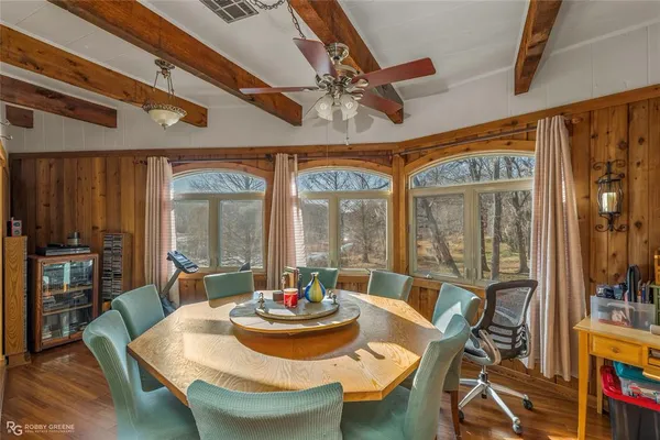 a kitchen with stainless steel appliances granite countertop a refrigerator and a stove