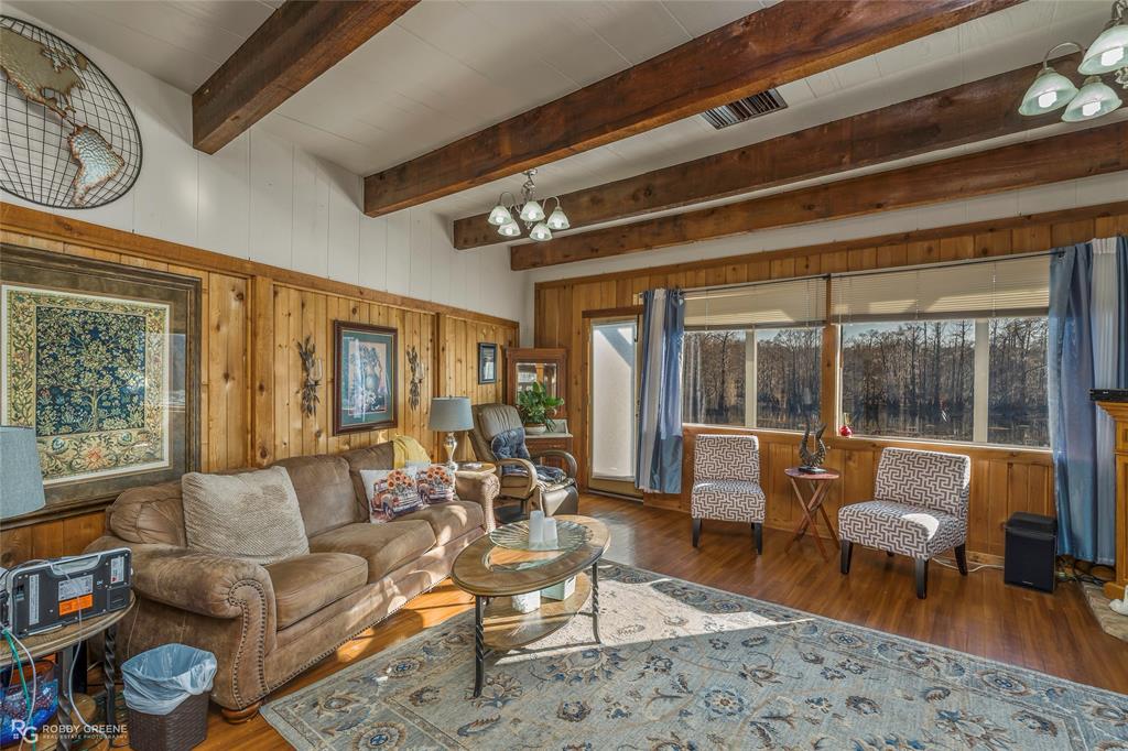 350 Brushy Creek Road Sibley, LA 71073 - Photo 19 of 40 a living room with furniture and a large window