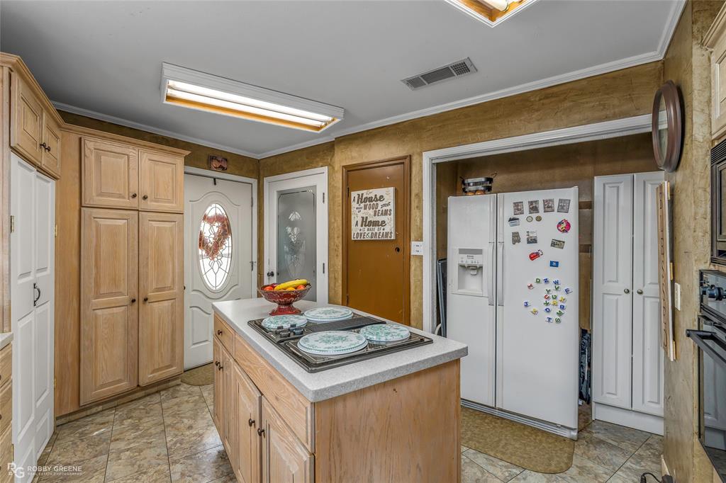 350 Brushy Creek Road Sibley, LA 71073 - Photo 27 of 40 a kitchen with stainless steel appliances granite countertop a refrigerator and a stove