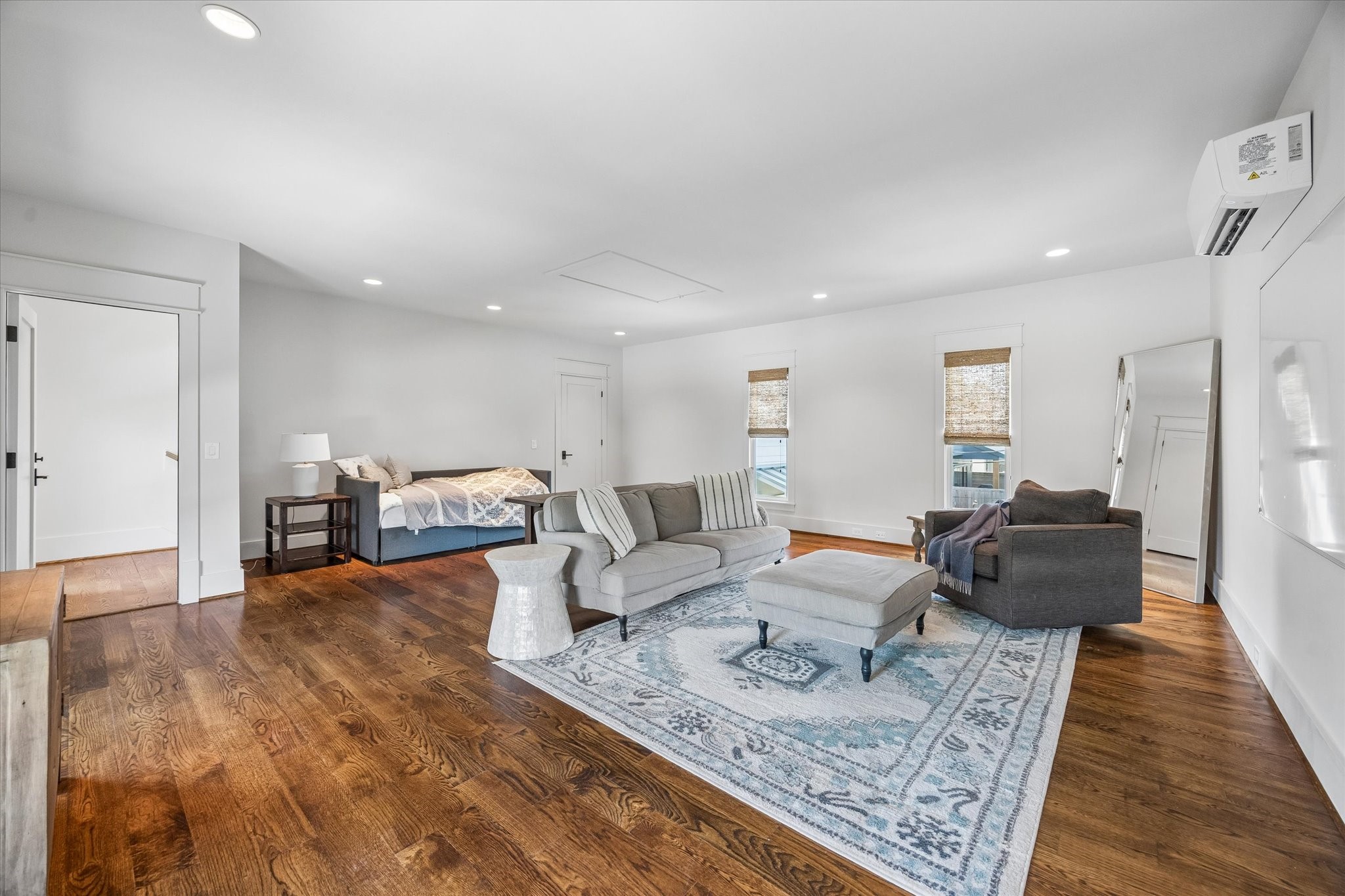 1101 Omar Street Houston, TX 77009 - Photo 33 of 46 Versatile bonus space above the garage offers endless flexibility for a game room, media room, gym, guest retreat, or creative studio, complete with its own split A/C system and large storage closet.