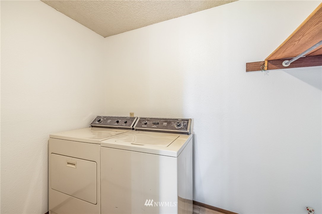4308 Northeast Sunset Boulevard, Unit F3 Renton, WA 98059 - Photo 18 of 26 a utility room with dryer and washer