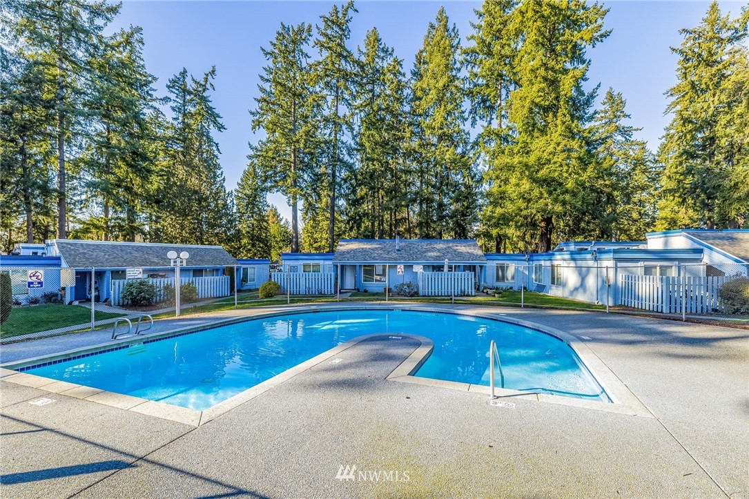 4308 Northeast Sunset Boulevard, Unit F3 Renton, WA 98059 - Photo 24 of 26 a view of swimming pool with chairs
