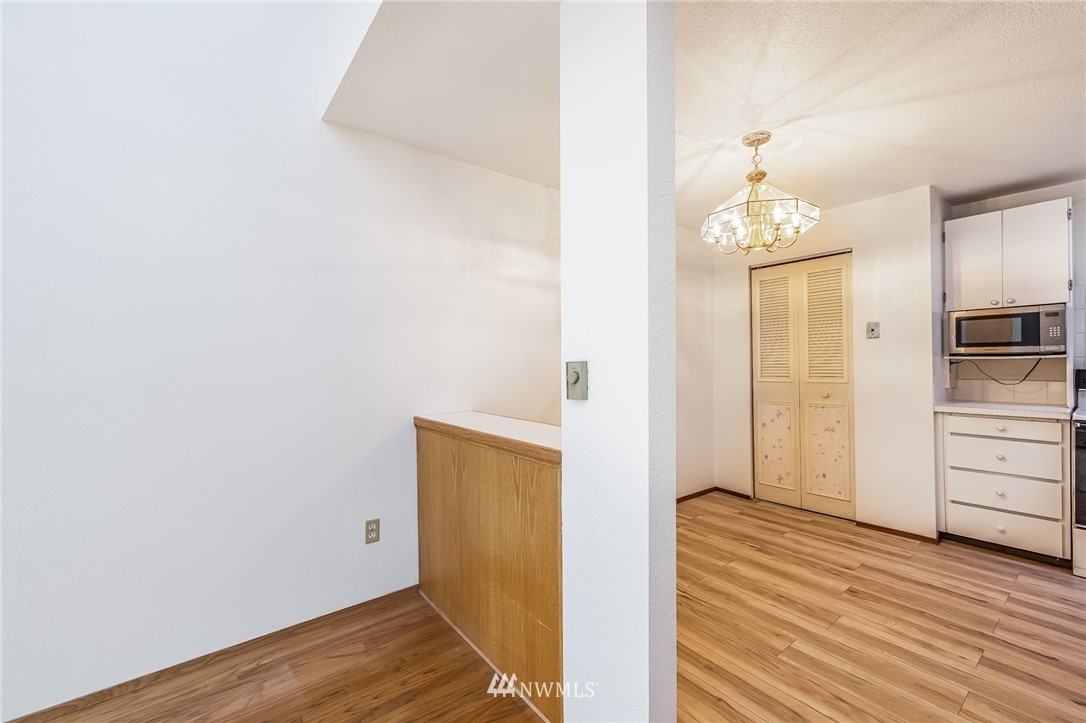 4308 Northeast Sunset Boulevard, Unit F3 Renton, WA 98059 - Photo 7 of 26 a view of a room with wooden floor