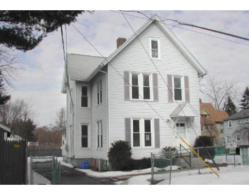 62 Peer Street Springfield, MA 01109 - Photo 1 of 1 a front view of a house with a yard