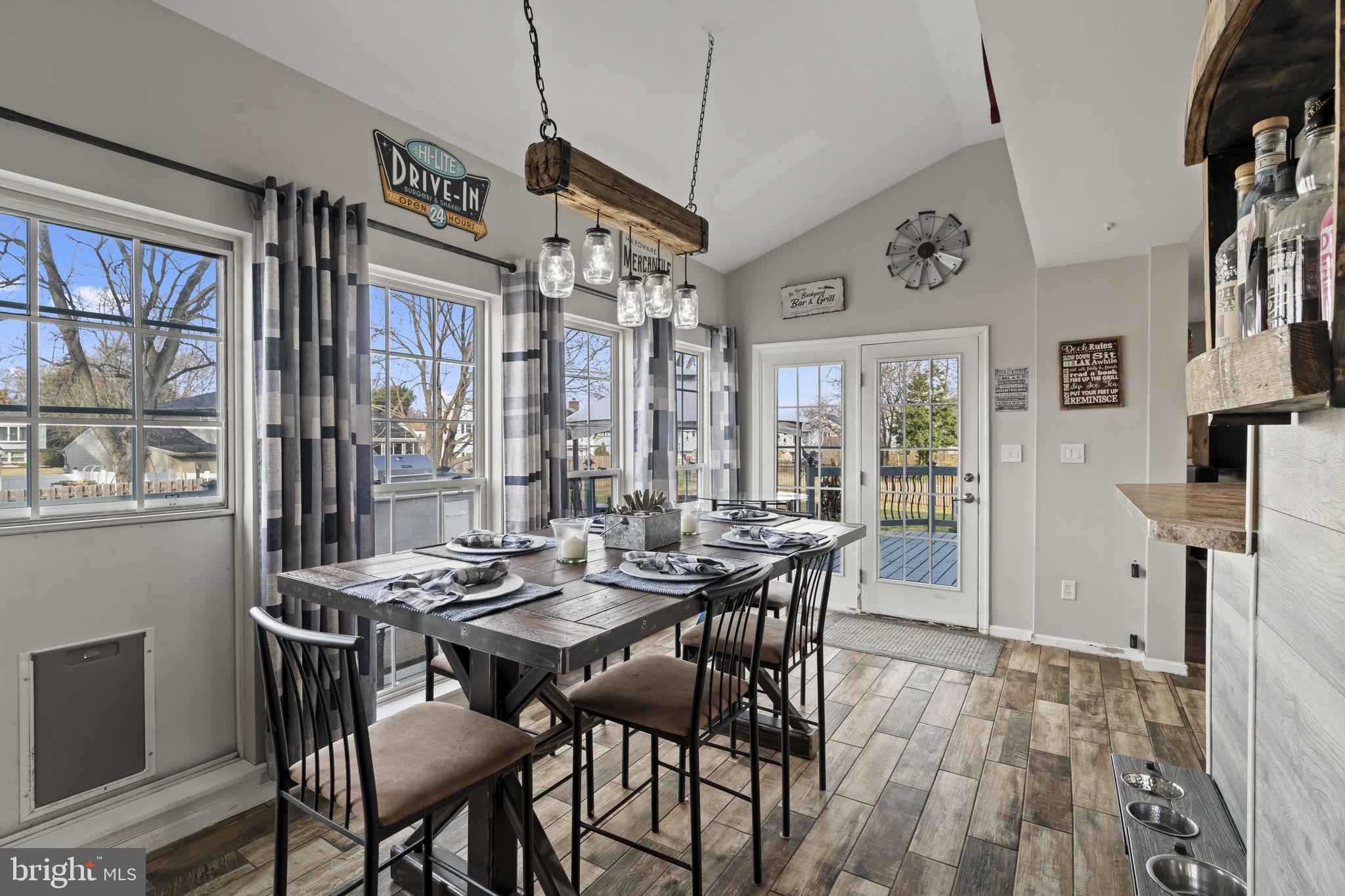 5 Panama Court Carneys Point, NJ 08069 - Photo 16 of 36 a view of a dining room with furniture window and wooden floor