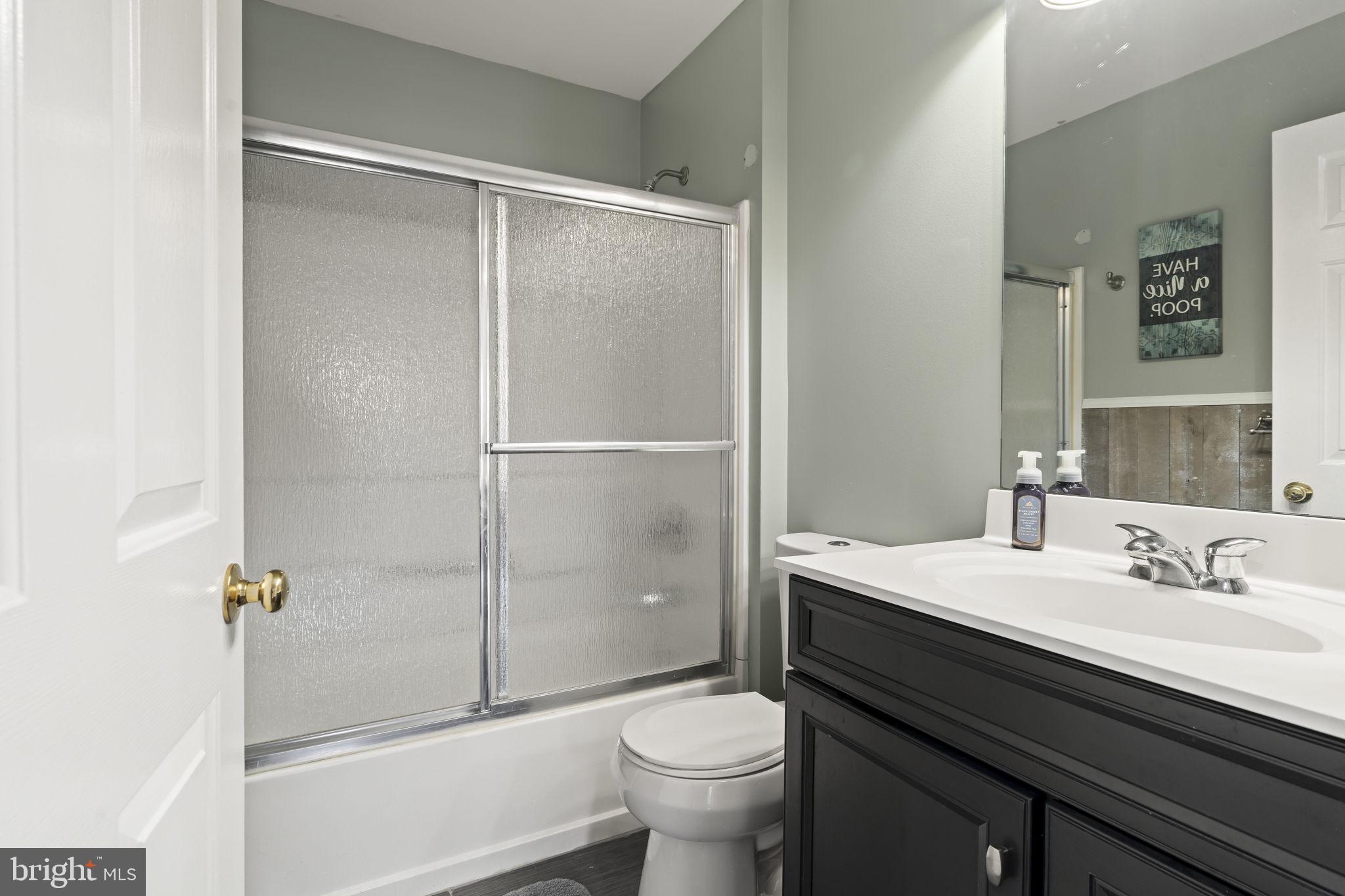 5 Panama Court Carneys Point, NJ 08069 - Photo 19 of 36 a bathroom with a granite countertop sink toilet and shower