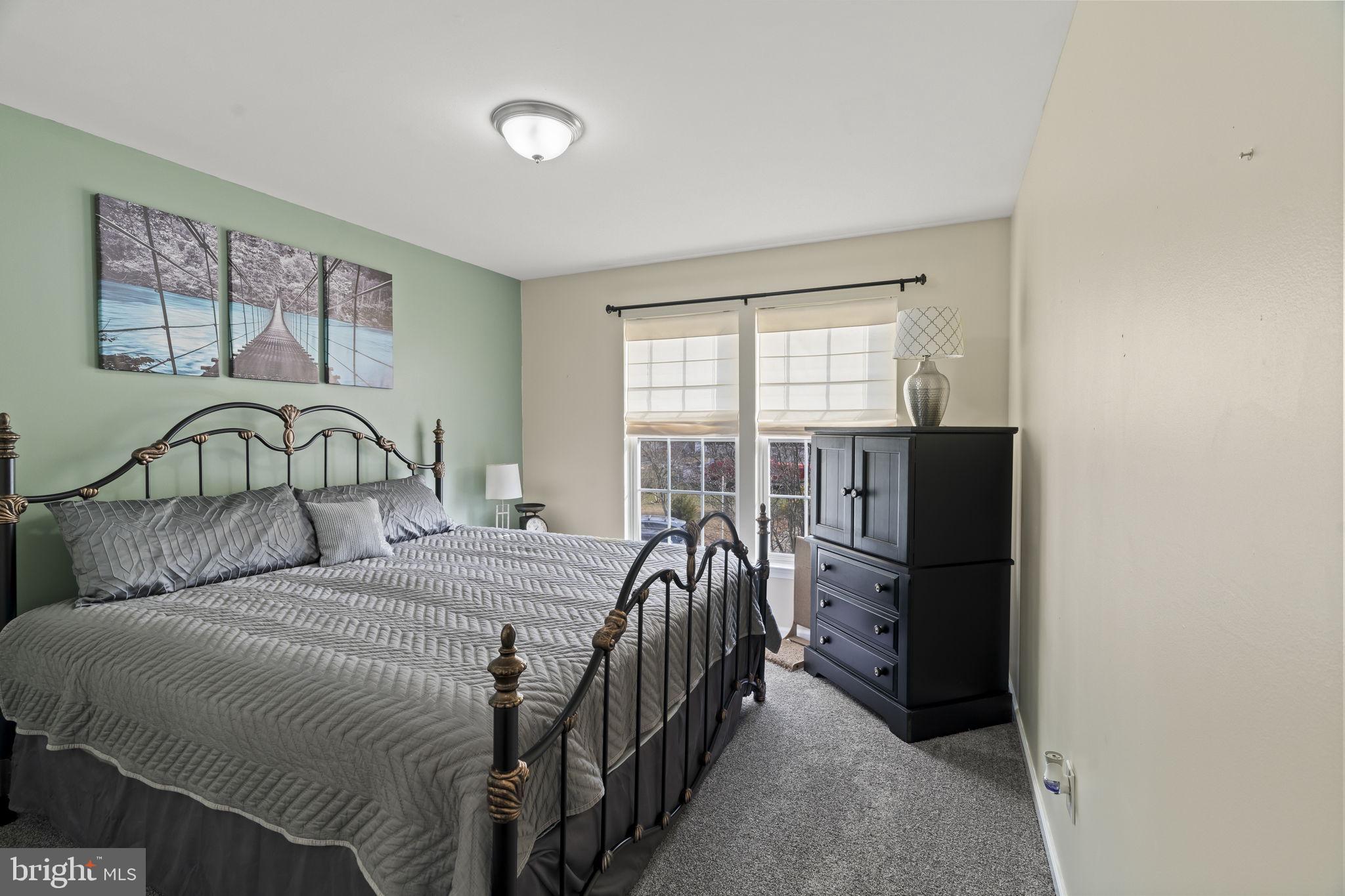 5 Panama Court Carneys Point, NJ 08069 - Photo 21 of 36 a bedroom with a bed and a large window
