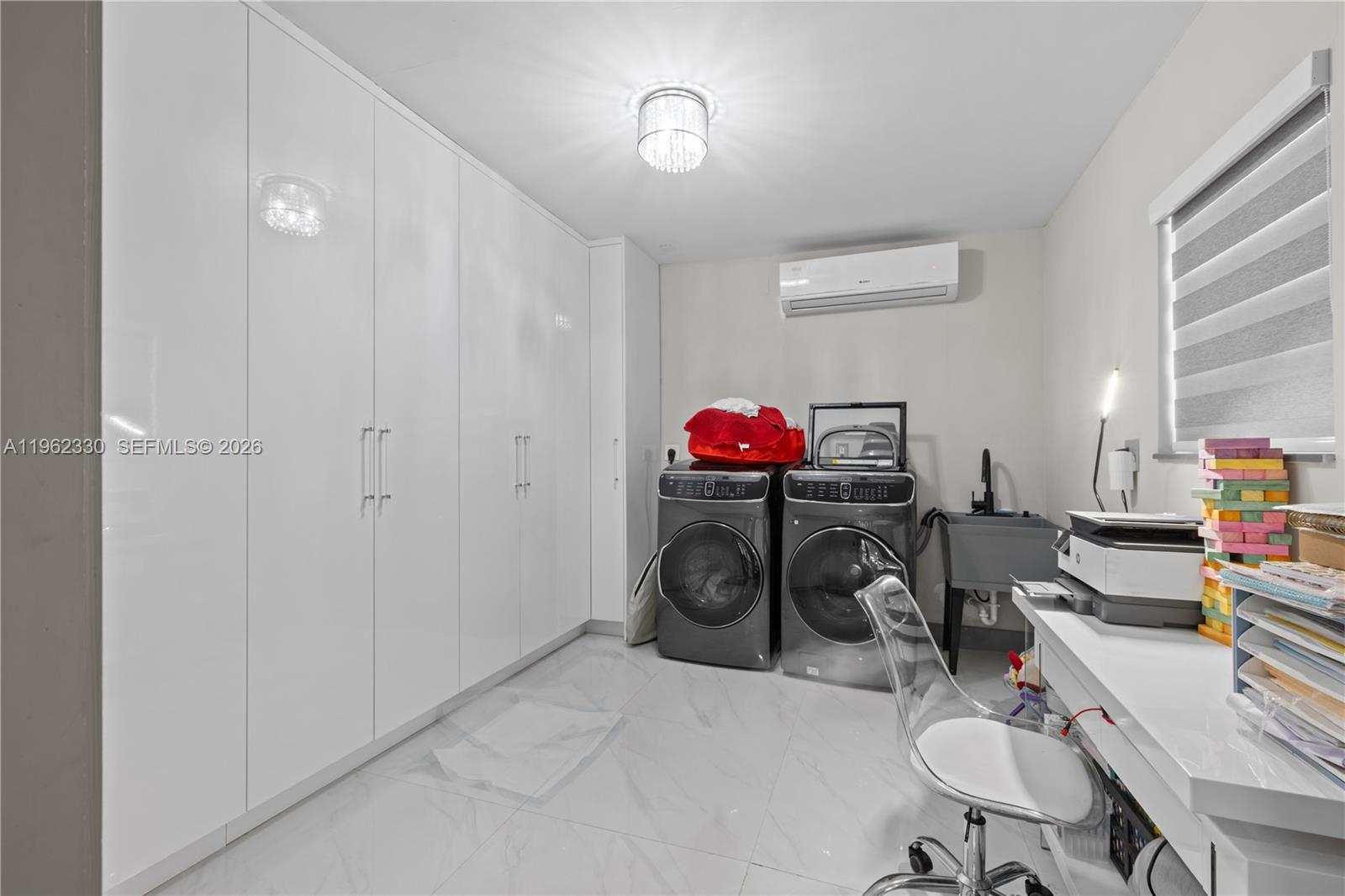 33300 Southwest 212th Avenue Homestead, FL 33034 - Photo 14 of 60 a view of a workspace with furniture