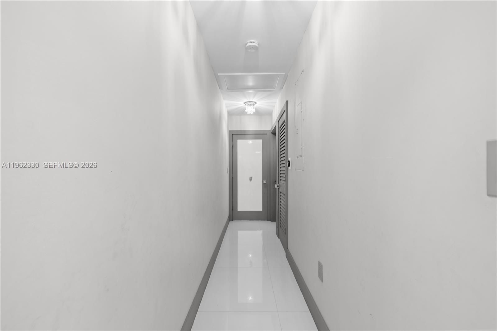 33300 Southwest 212th Avenue Homestead, FL 33034 - Photo 16 of 60 a view of a hallway