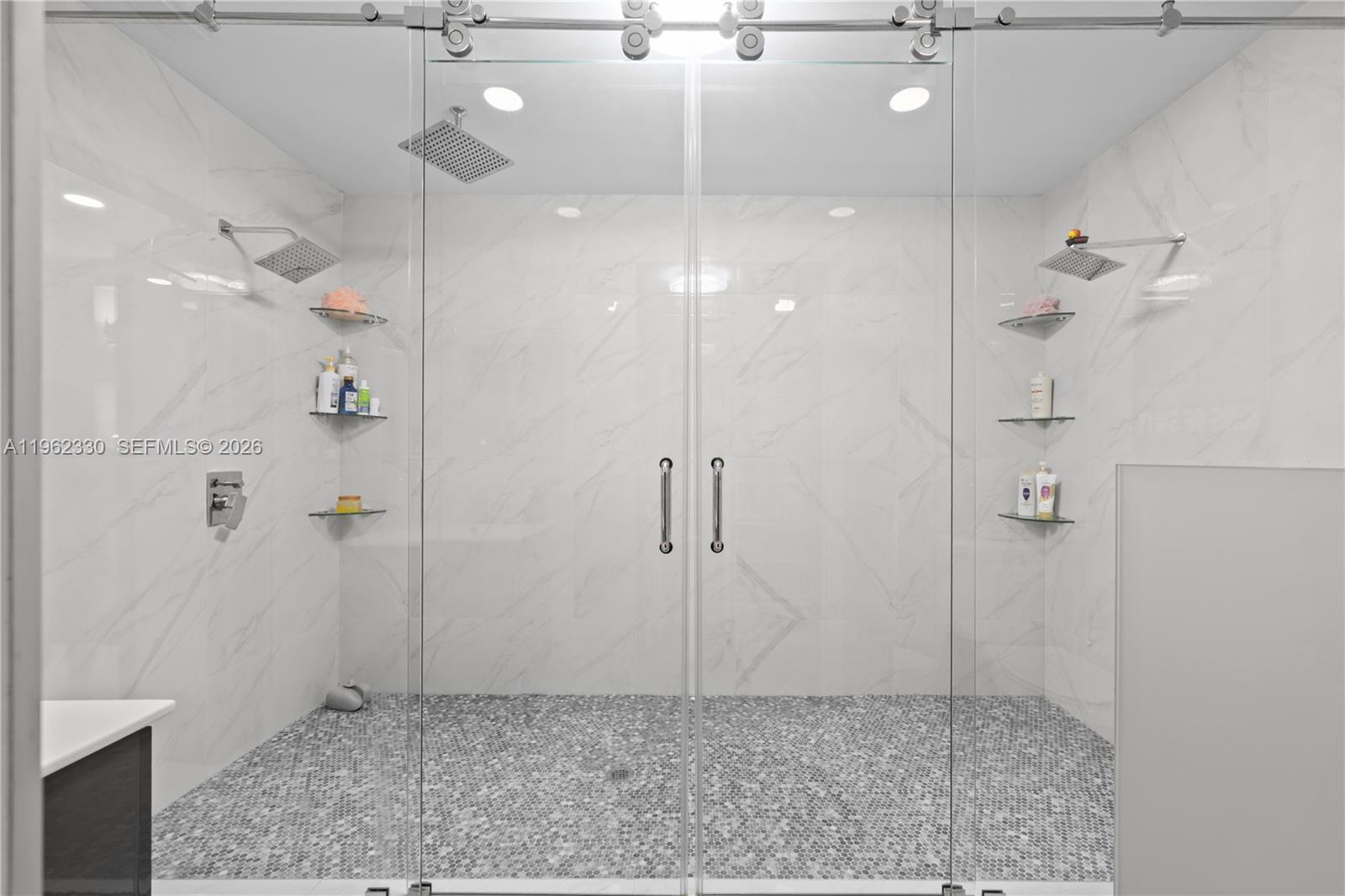 33300 Southwest 212th Avenue Homestead, FL 33034 - Photo 20 of 60 a bathroom with a shower