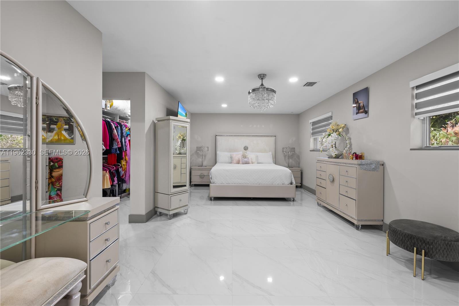 33300 Southwest 212th Avenue Homestead, FL 33034 - Photo 21 of 60 a bedroom with a bed and a cabinets