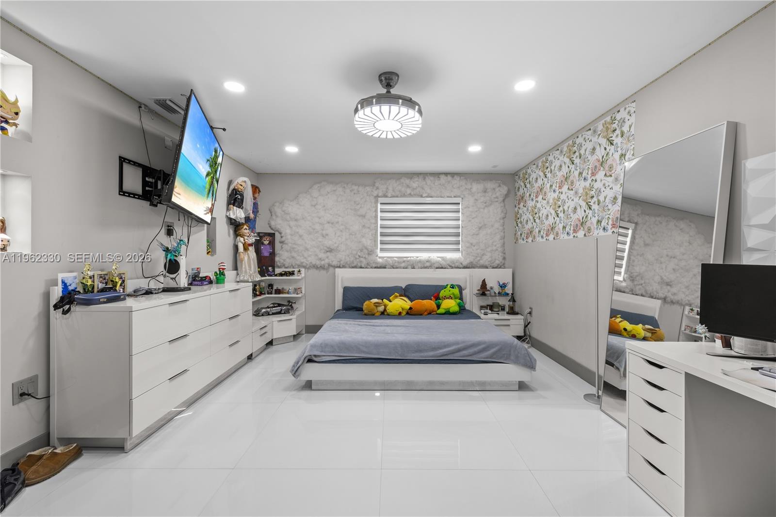 33300 Southwest 212th Avenue Homestead, FL 33034 - Photo 23 of 60 a kitchen with stainless steel appliances kitchen island granite countertop a stove and a sink