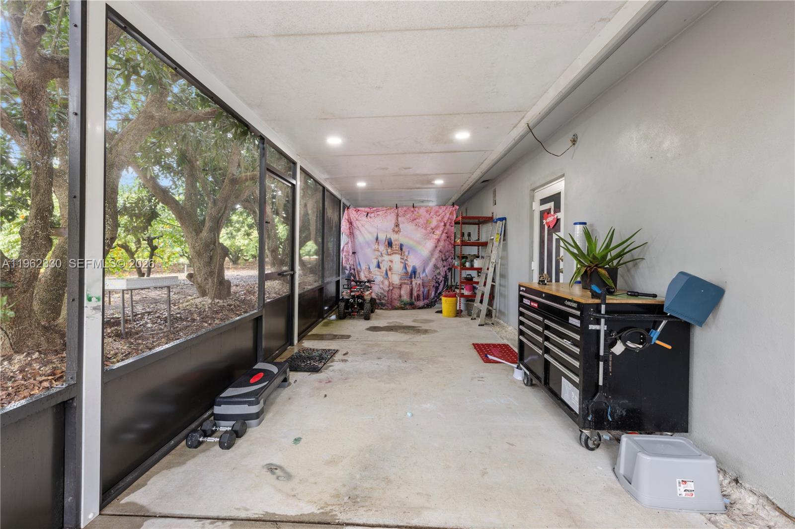 33300 Southwest 212th Avenue Homestead, FL 33034 - Photo 29 of 60 a view of entryway with livingroom