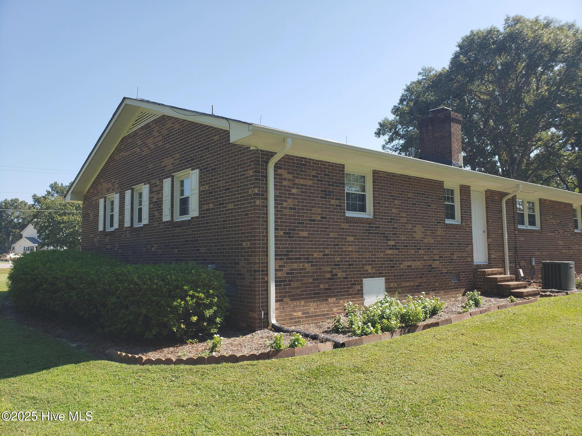 7135 Fate Road Lucama, NC 27851 - Photo 4 of 33 GUTTERS IN 2023! BACK CORNER VIEW