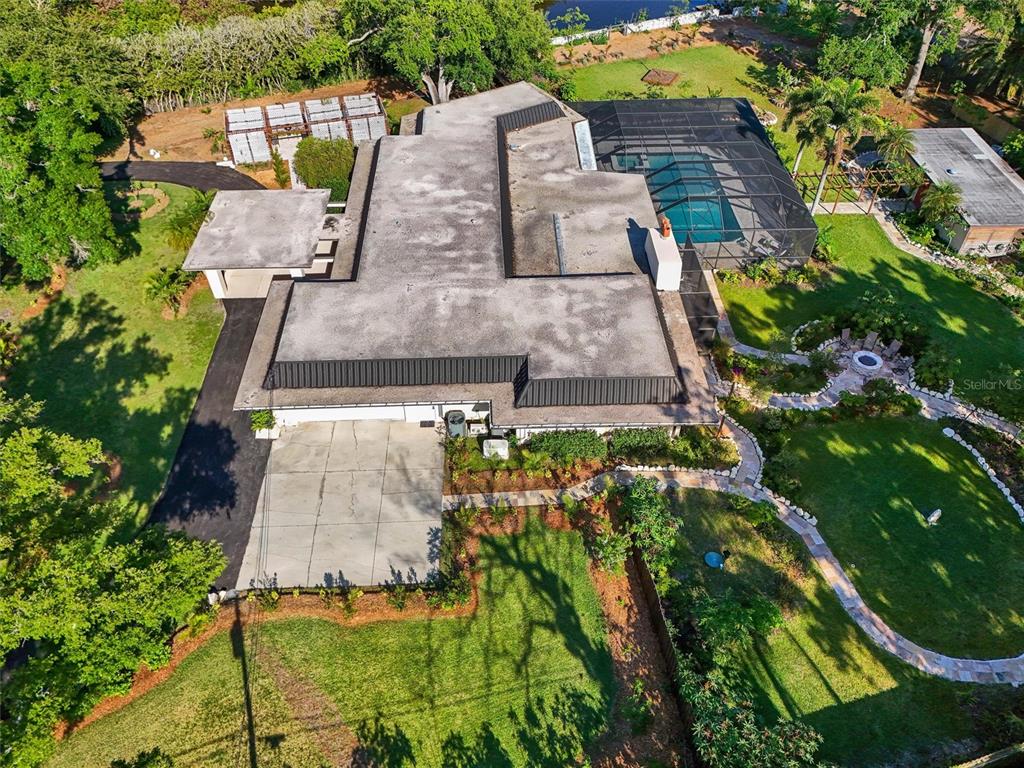 1875 Belleair Road Clearwater, FL 33764 - Photo 84 of 100 an aerial view of residential houses with outdoor space
