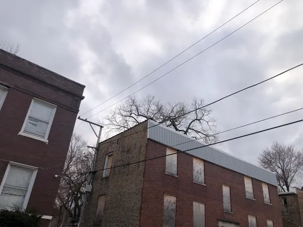 a view of a house with a street