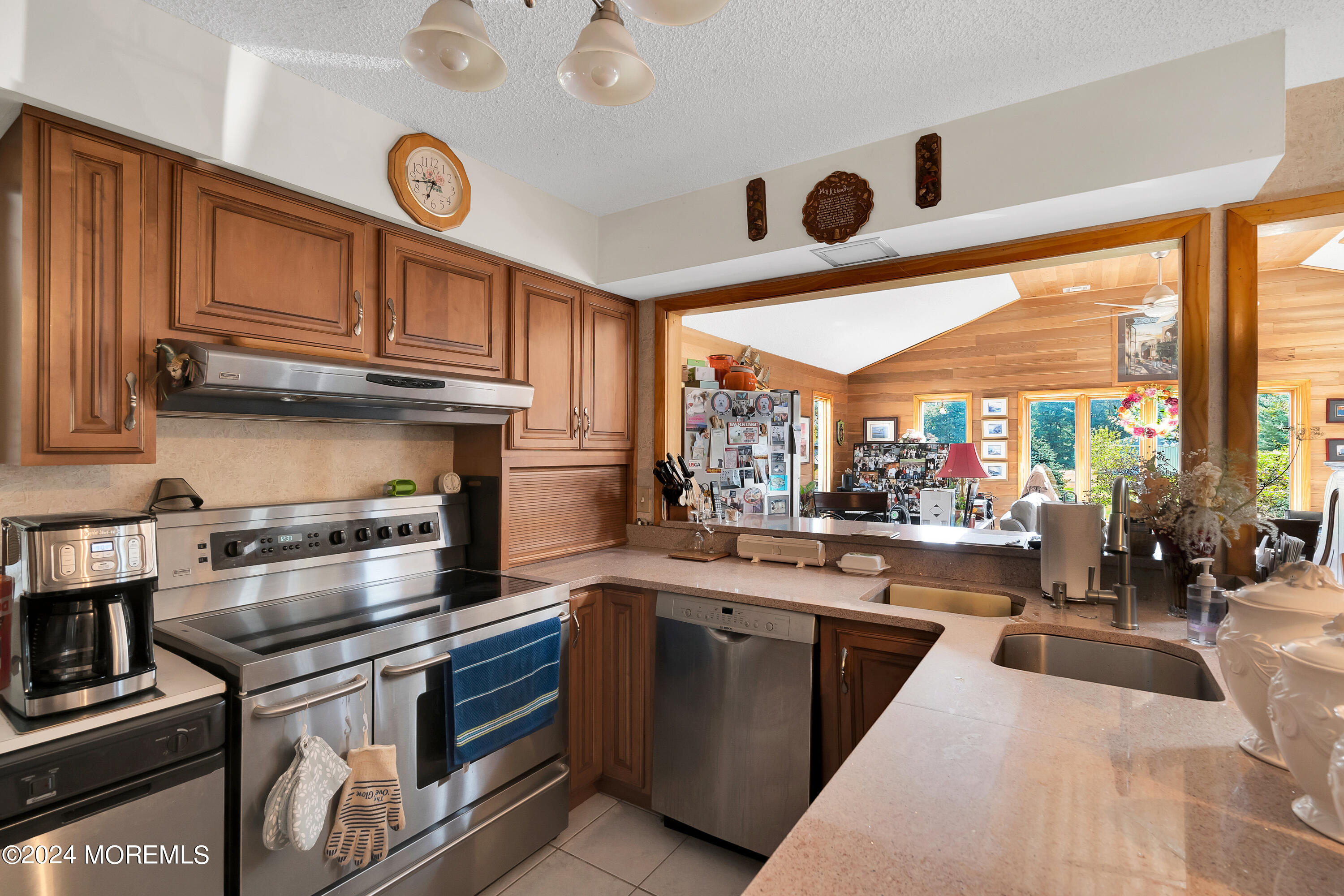 1521 Silverton Road Toms River, NJ 08755 - Photo 13 of 59 a kitchen with stainless steel appliances granite countertop a stove and a sink
