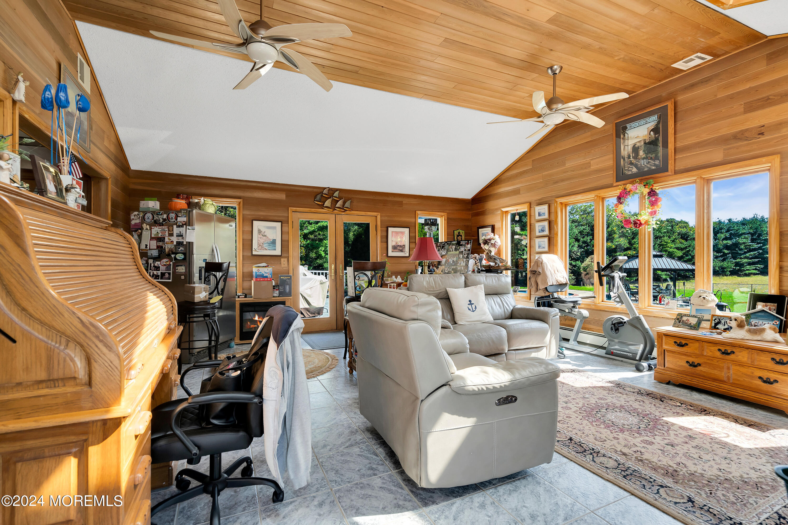 1521 Silverton Road Toms River, NJ 08755 - Photo 16 of 59 a living room with furniture and a floor to ceiling window