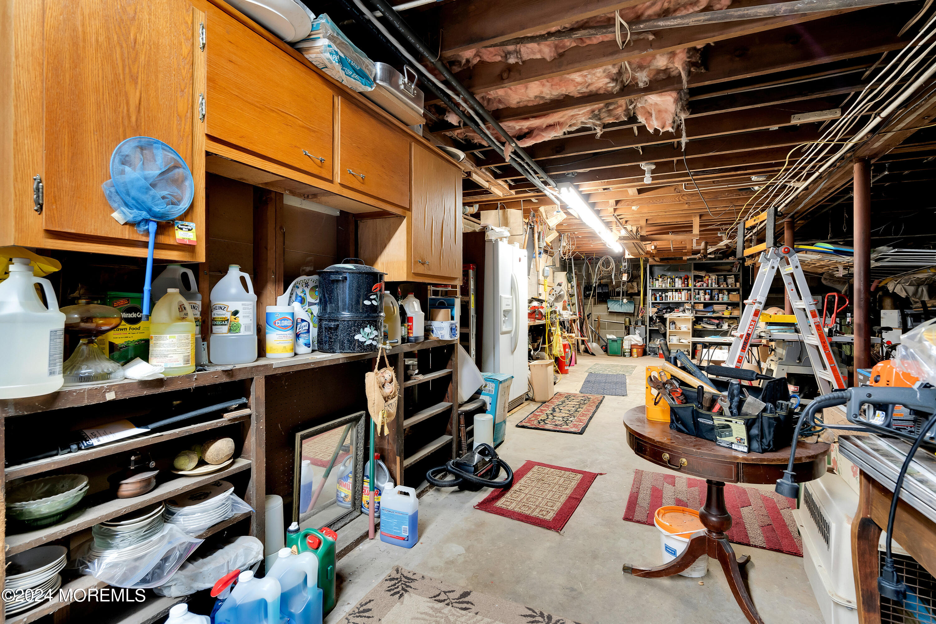 1521 Silverton Road Toms River, NJ 08755 - Photo 19 of 59 a view of a storage room with washer and dryer