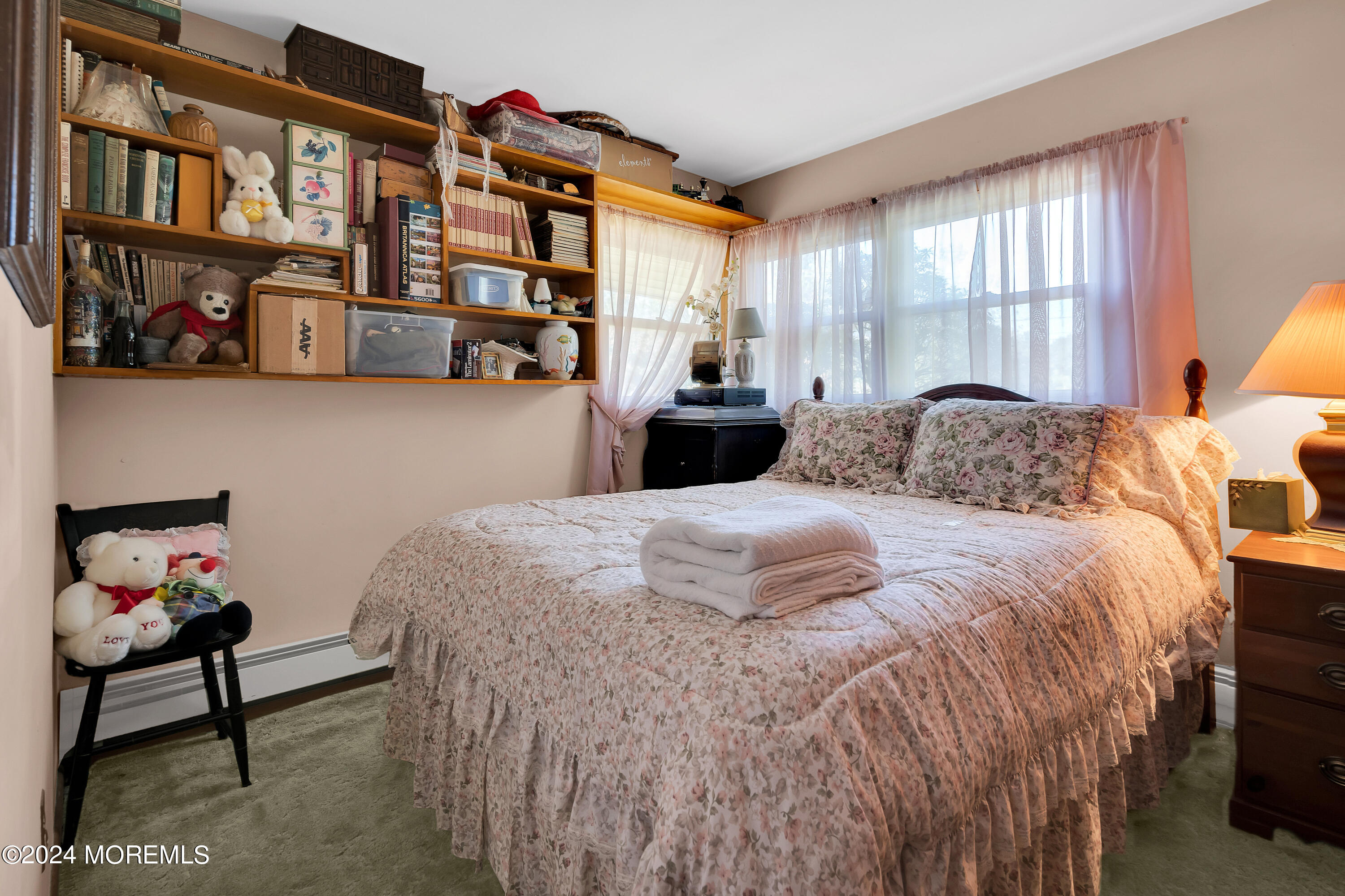1521 Silverton Road Toms River, NJ 08755 - Photo 22 of 59 a bedroom with a bed a dresser and a large window