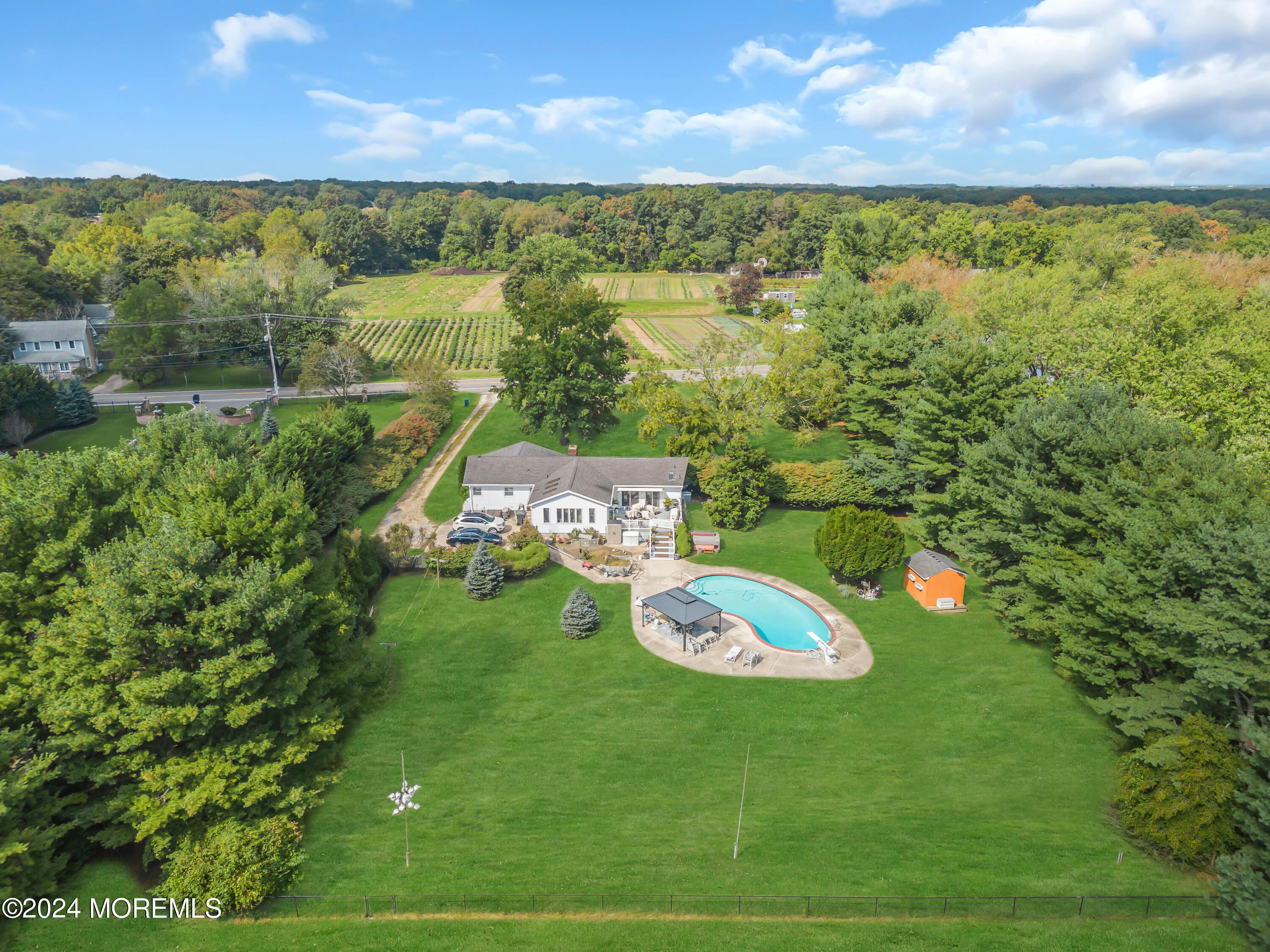 1521 Silverton Road Toms River, NJ 08755 - Photo 40 of 59 a aerial view of a house with a yard