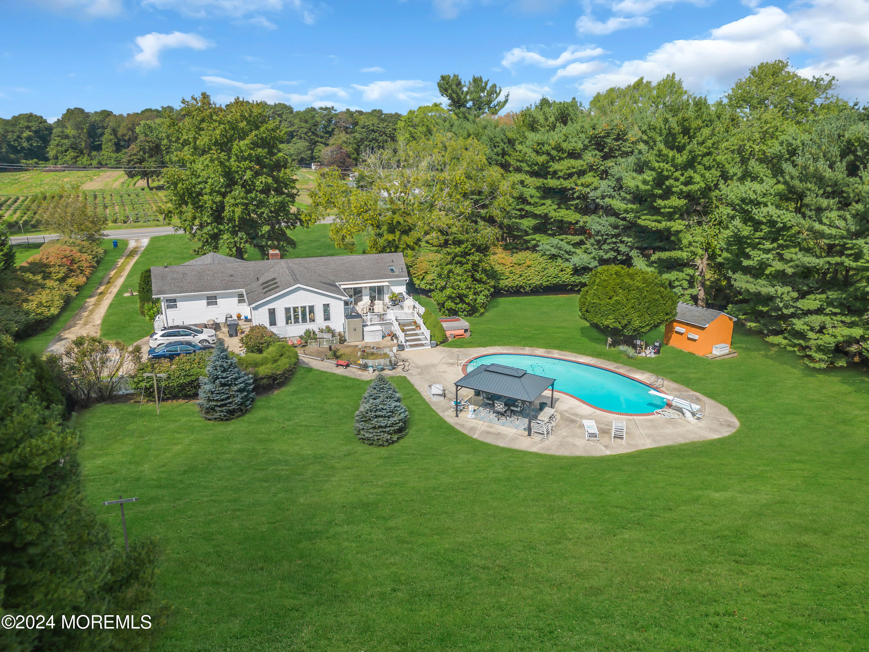1521 Silverton Road Toms River, NJ 08755 - Photo 41 of 59 an aerial view of a house with a yard