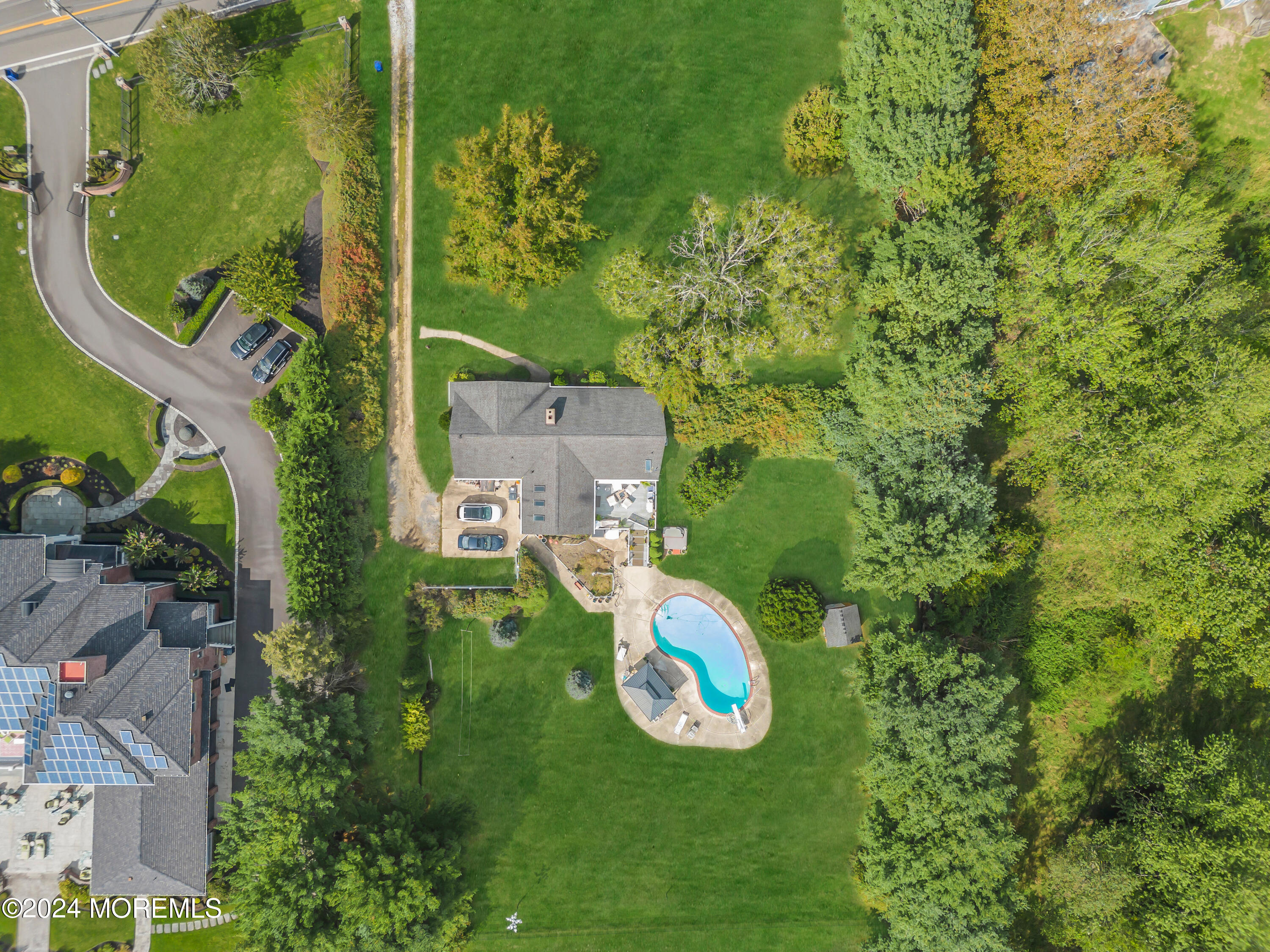 1521 Silverton Road Toms River, NJ 08755 - Photo 43 of 59 an aerial view of a house with a yard