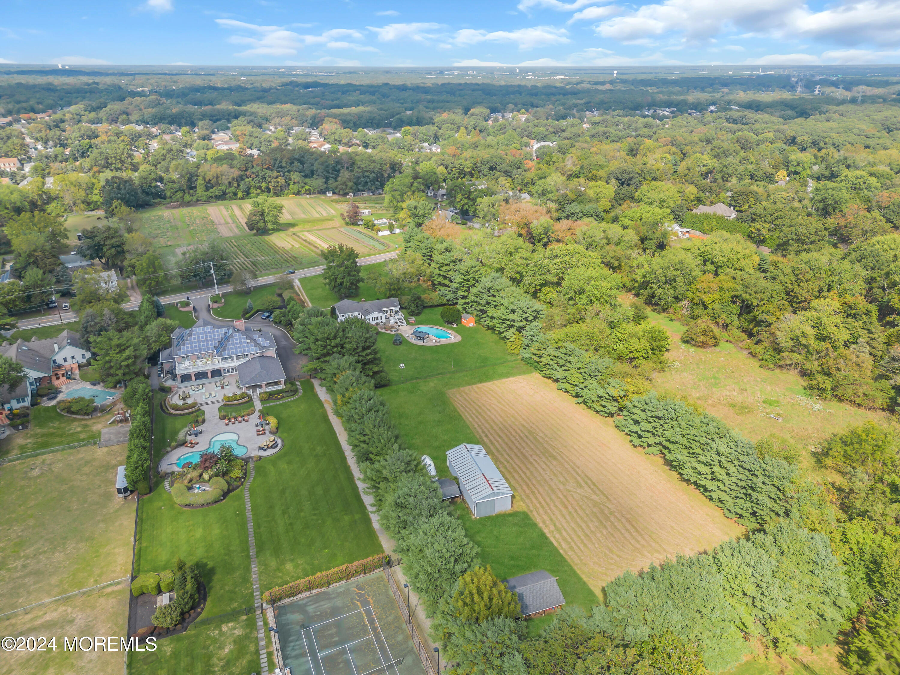 1521 Silverton Road Toms River, NJ 08755 - Photo 46 of 59 a view of a lake with a yard