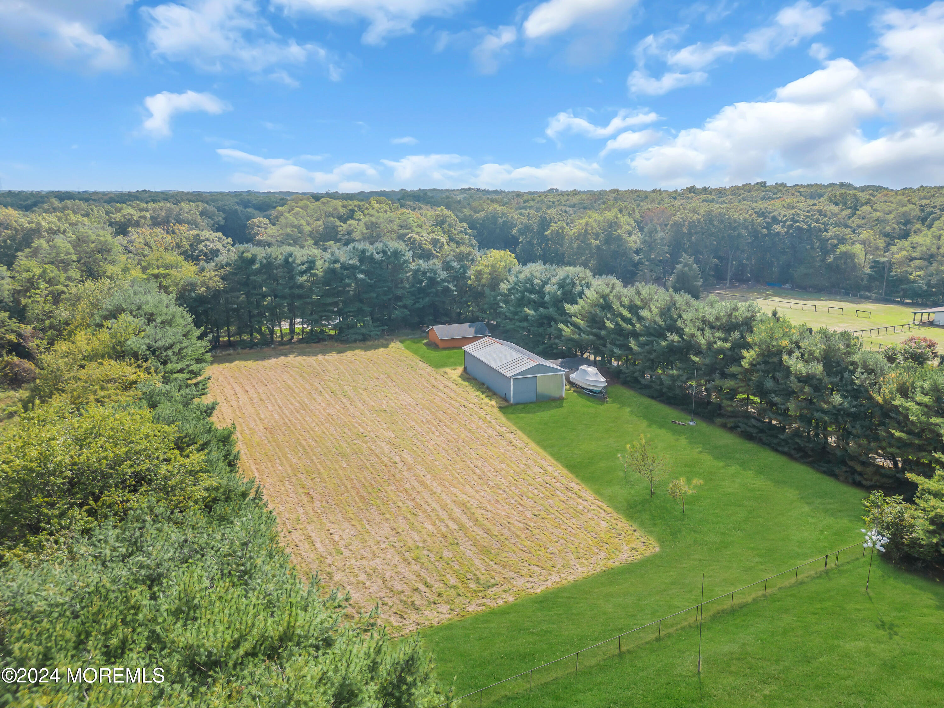 1521 Silverton Road Toms River, NJ 08755 - Photo 50 of 59 an aerial view of residential houses with outdoor space and trees