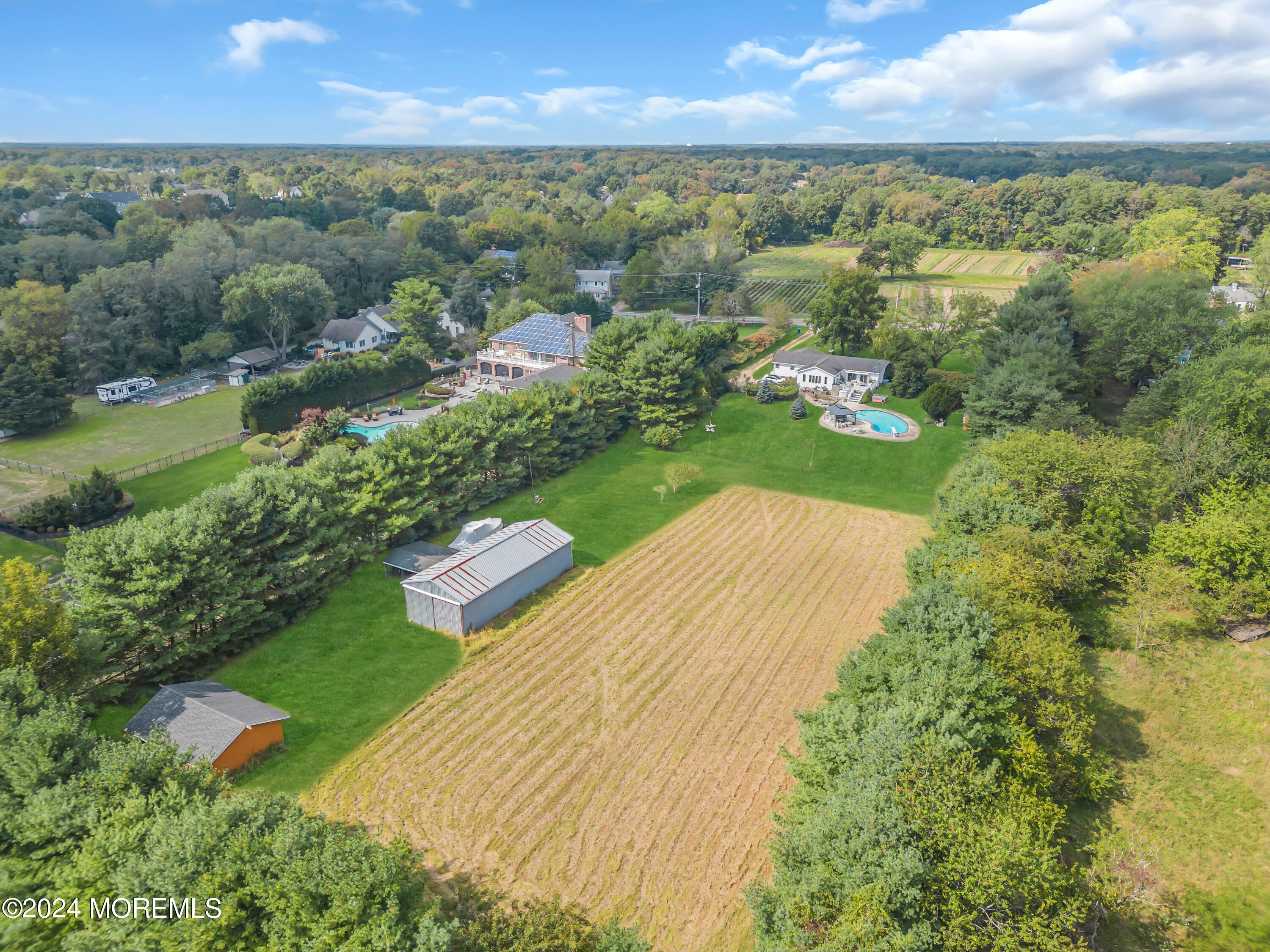 1521 Silverton Road Toms River, NJ 08755 - Photo 56 of 59 an aerial view of residential houses with outdoor space and trees