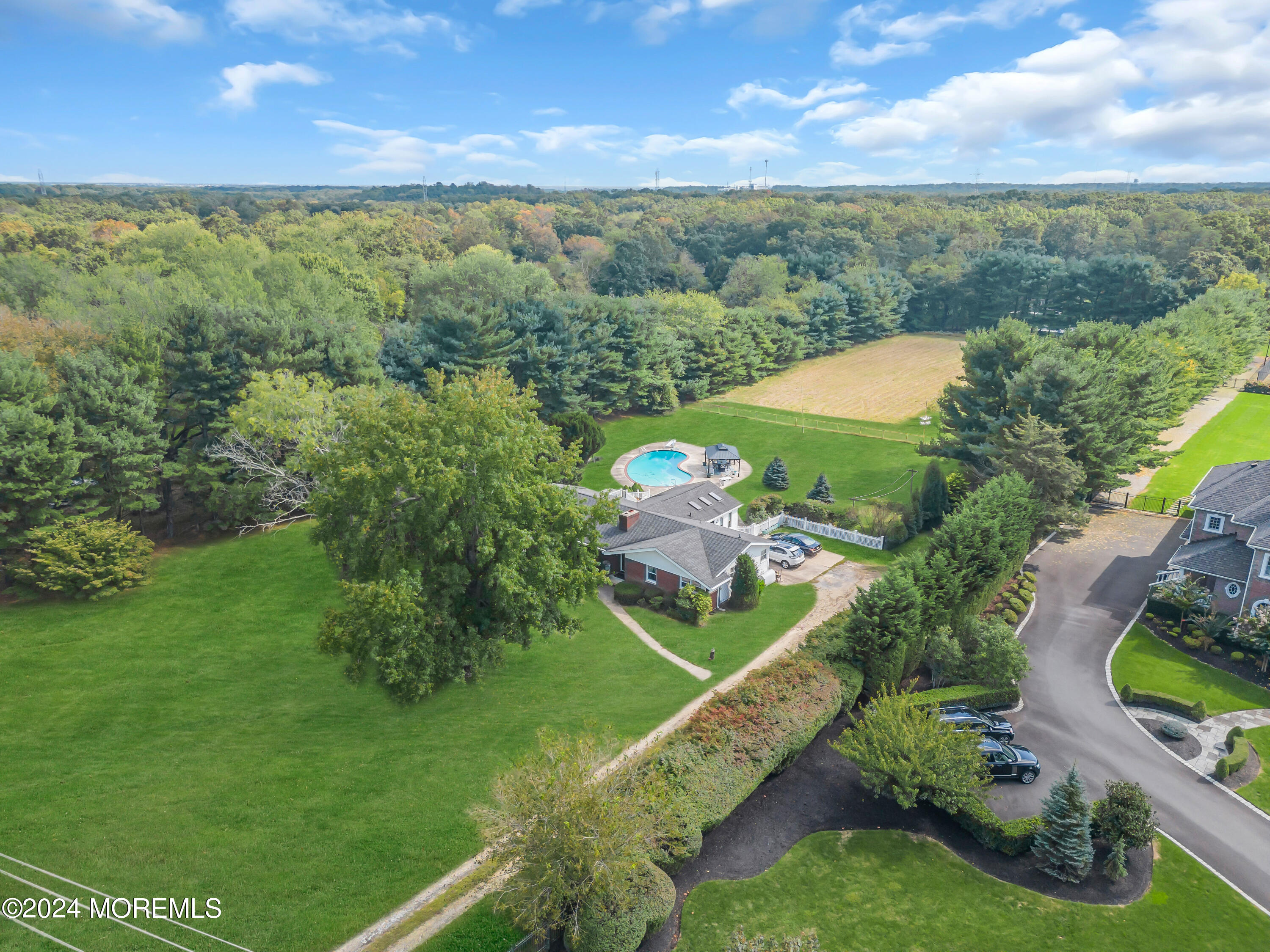 1521 Silverton Road Toms River, NJ 08755 - Photo 57 of 59 a view of a city with lush green forest