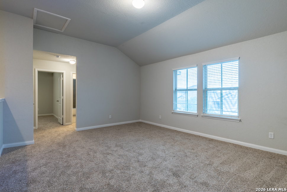 10230 Midsummer Meadow Converse, TX 78109 - Photo 20 of 37 an empty room with a empty space and windows