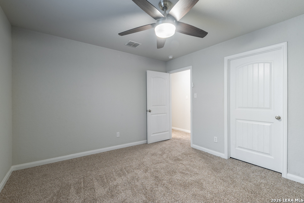 10230 Midsummer Meadow Converse, TX 78109 - Photo 28 of 37 an empty room with a empty space and a ceiling fan